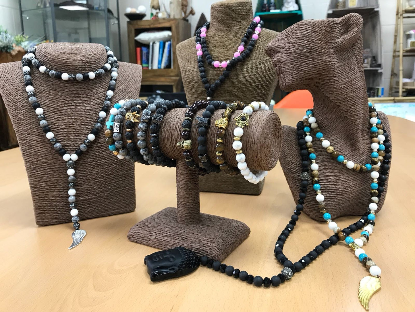 Handcrafted Boho Gemstone Necklace - Multi Bead Gemstones / Gold Angel Wing product packaging on clean background from Quintessential Holistic Health Ltd