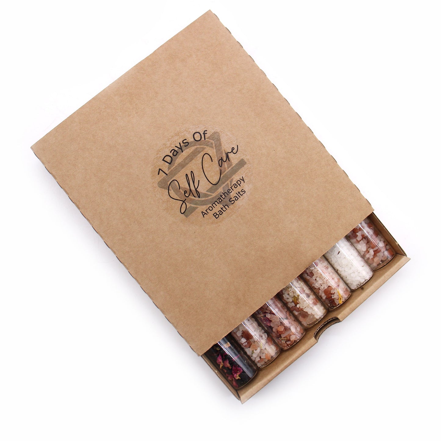 Gift Set of 7 Essential Oil Bath Salts in Vials, in a brown cardboard sleeve with the vials visible at one end, by Quintessential Holistic Health Ltd