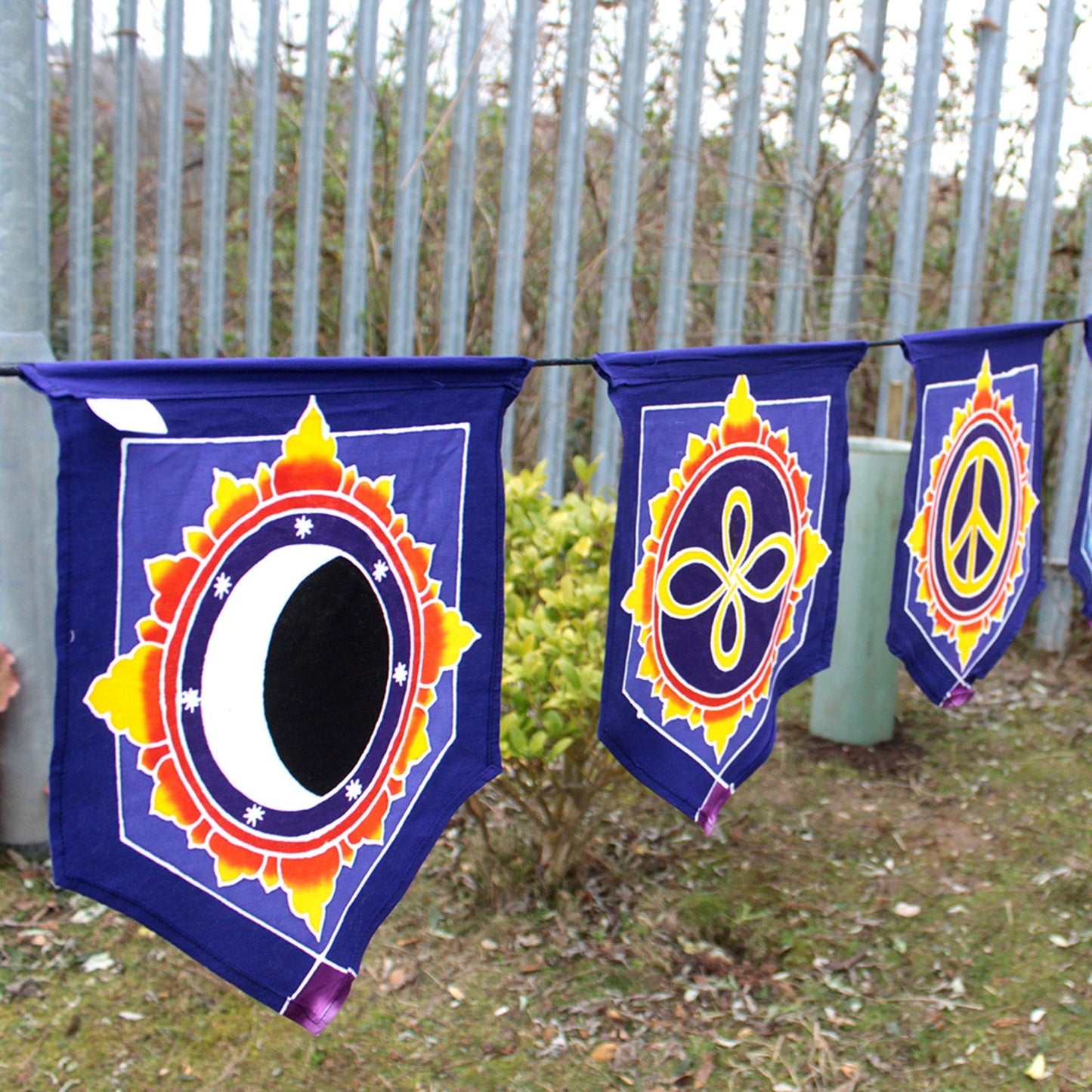 Handmade Batik Seven Flag Banner - Love in the Centre product packaging on clean background from Quintessential Holistic Health Ltd