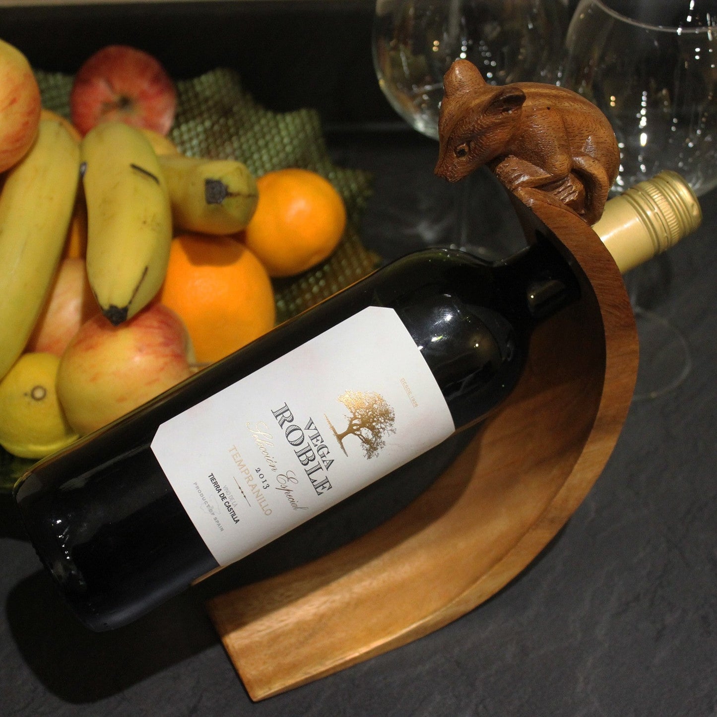 Mouse - Handmade High Quality Suar Wood Balancing Animal Wine Bottle Holder product packaging on clean background from Quintessential Holistic Health Ltd