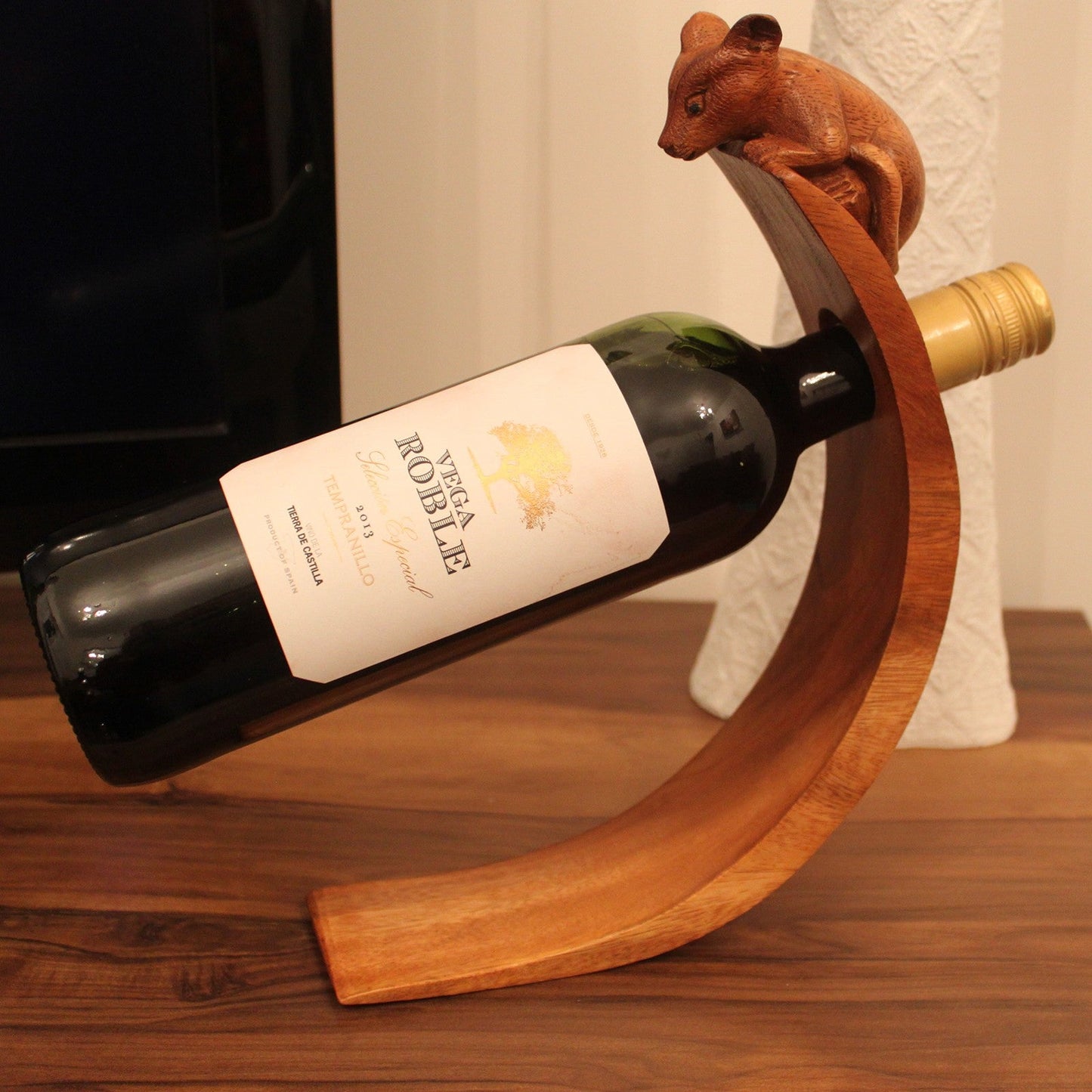 Mouse - Handmade High Quality Suar Wood Balancing Animal Wine Bottle Holder product packaging on clean background from Quintessential Holistic Health Ltd