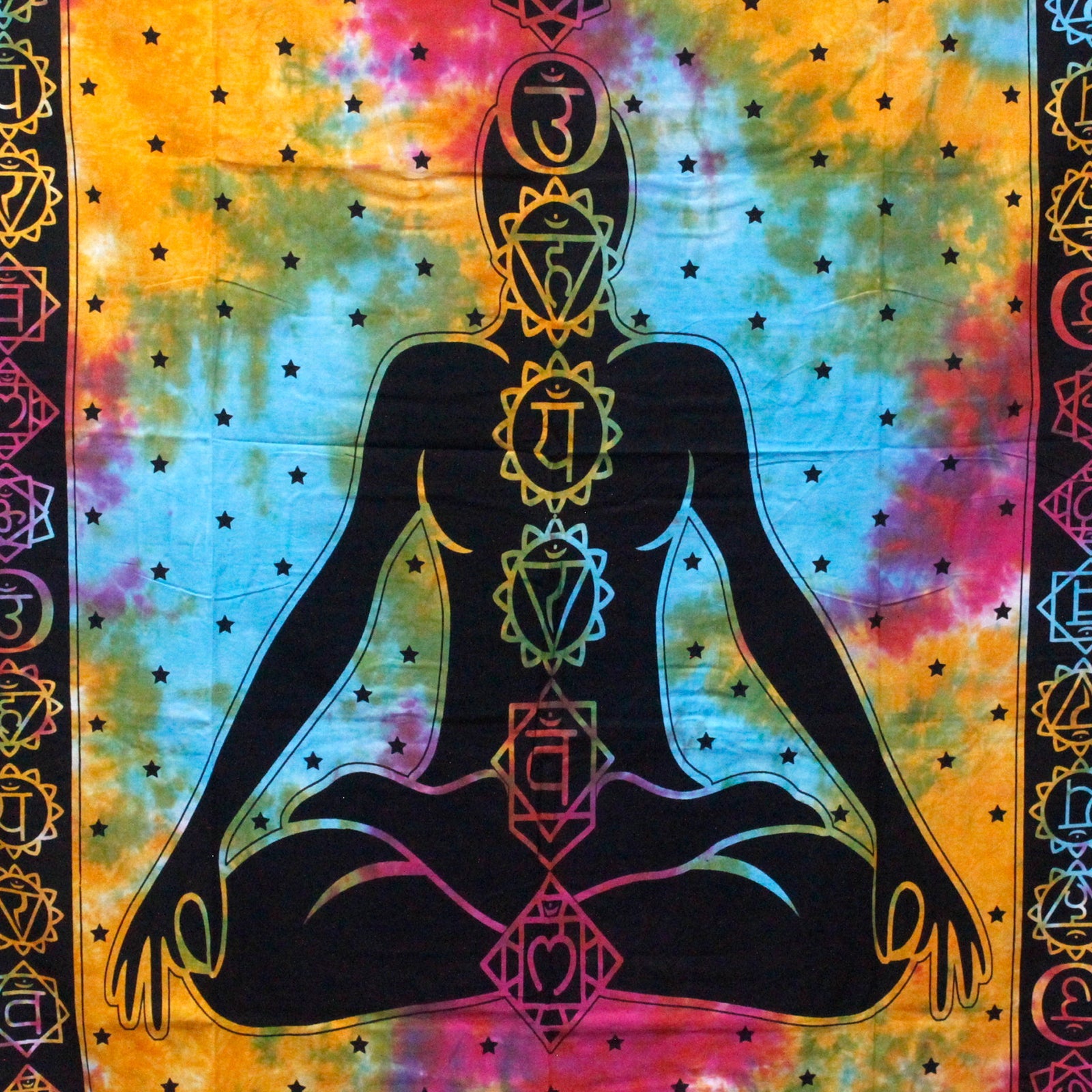Cotton Wall Hanging or Bedspread - Double - Chakra Buddha shown close-up with a seated silhouette on a bright tie-dye field by Quintessential Holistic Health Ltd
