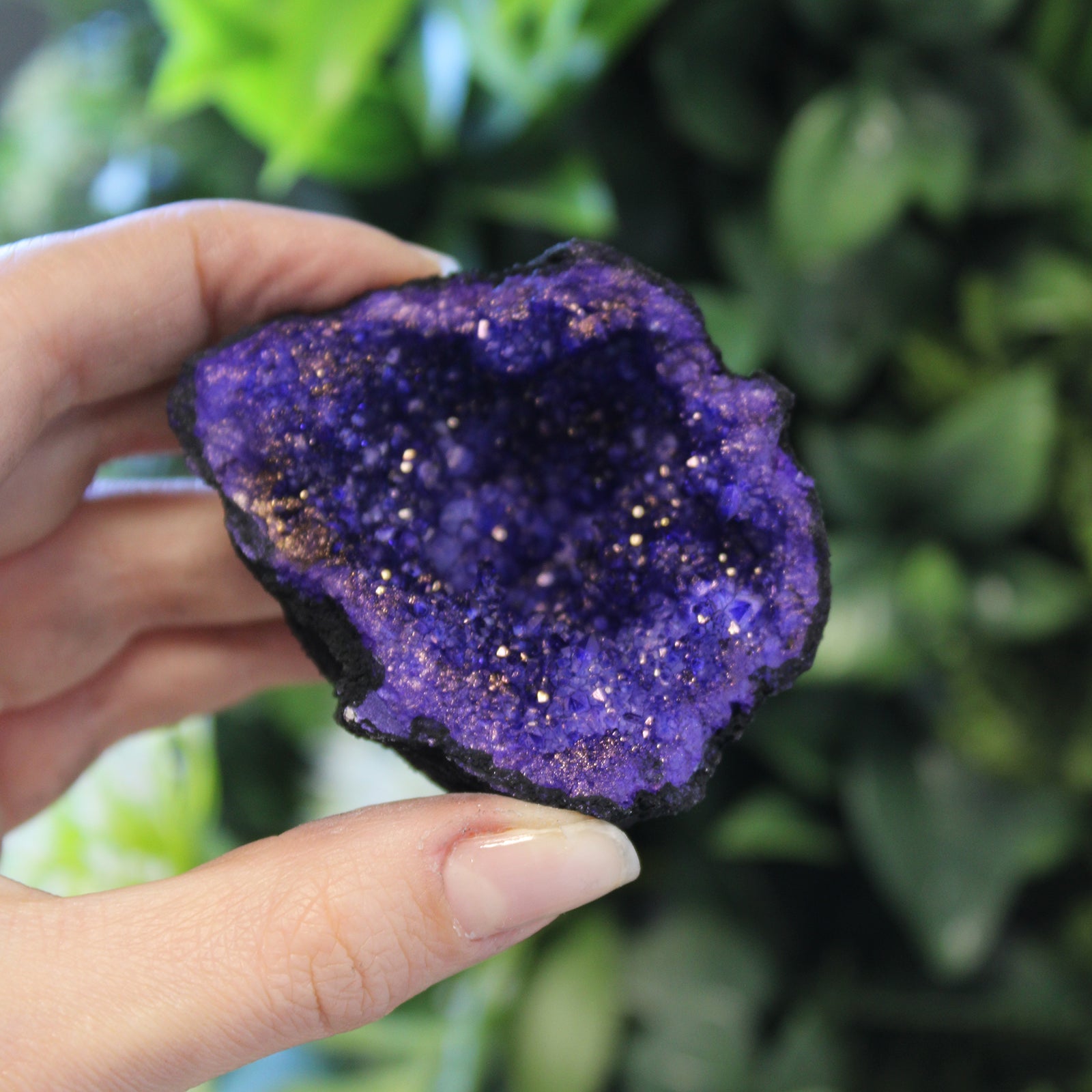 Coloured Natural Calcite Geode - Black Rock - Turquoise / Purple product packaging on clean background from Quintessential Holistic Health Ltd