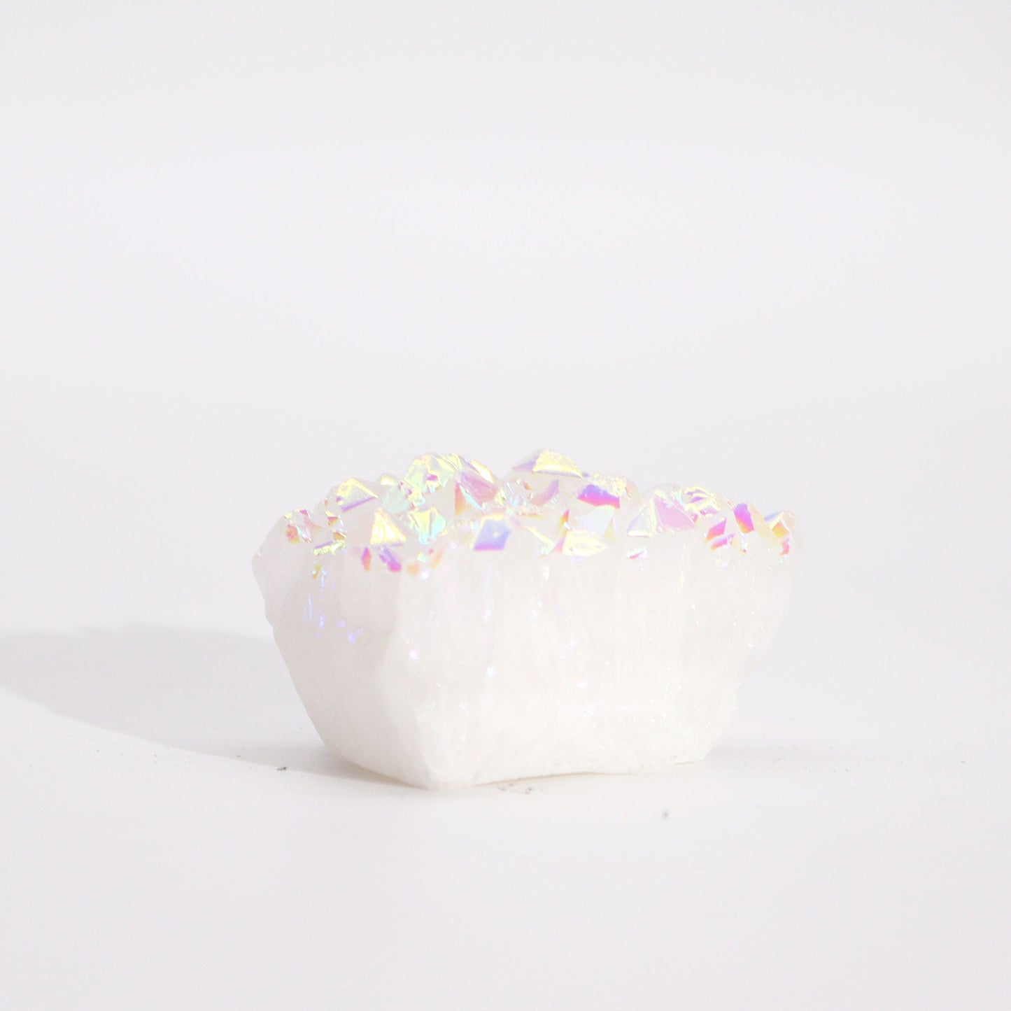 Handcrafted Natural Crystal Quartz - Small / Aura Angel product packaging on clean background from Quintessential Holistic Health Ltd
