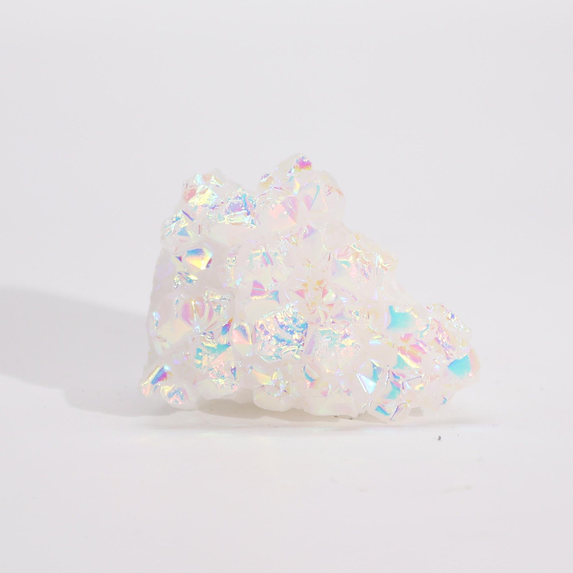 Handcrafted Natural Crystal Quartz - Small / Aura Angel product packaging on clean background from Quintessential Holistic Health Ltd