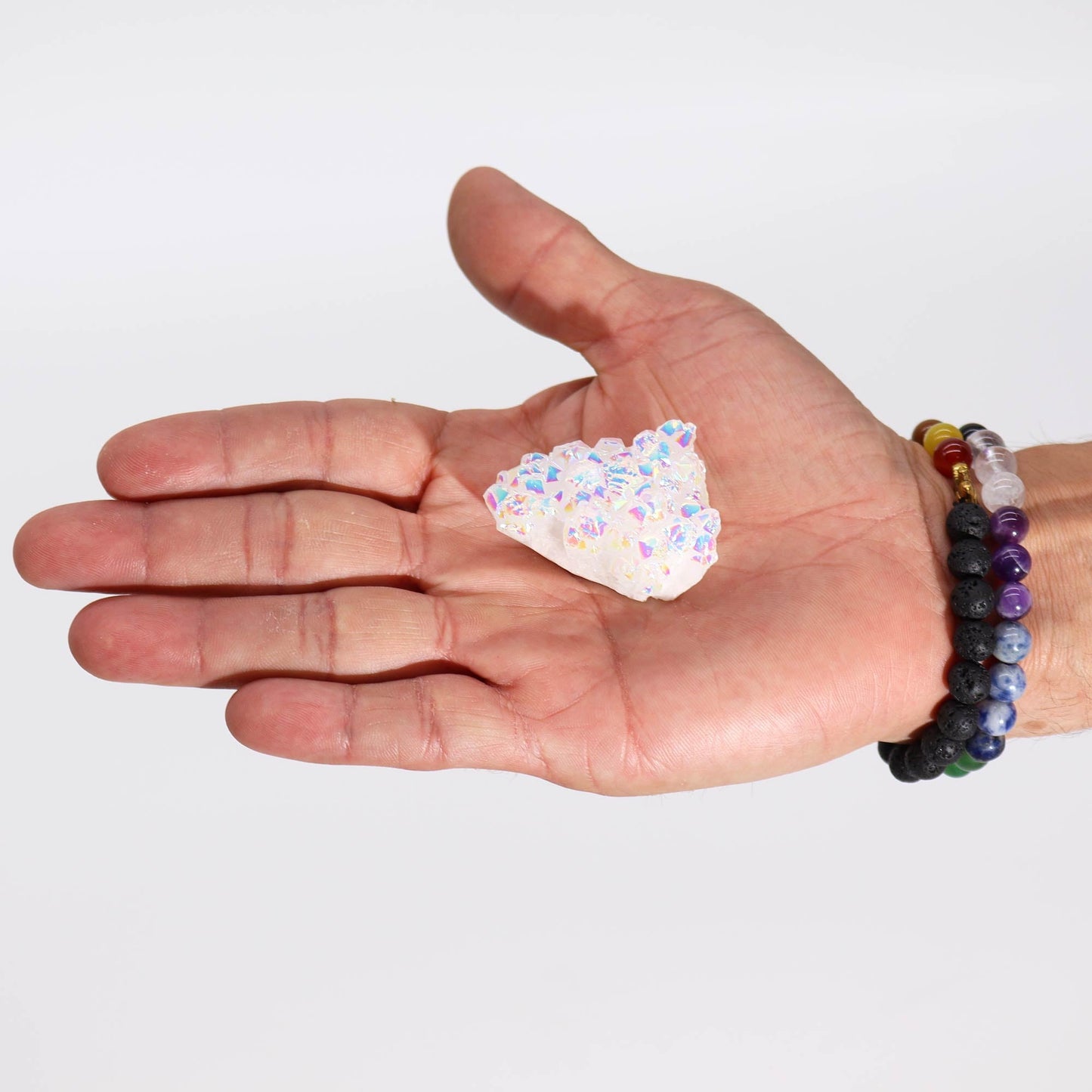 Handcrafted Natural Crystal Quartz - Small / Aura Angel product packaging on clean background from Quintessential Holistic Health Ltd