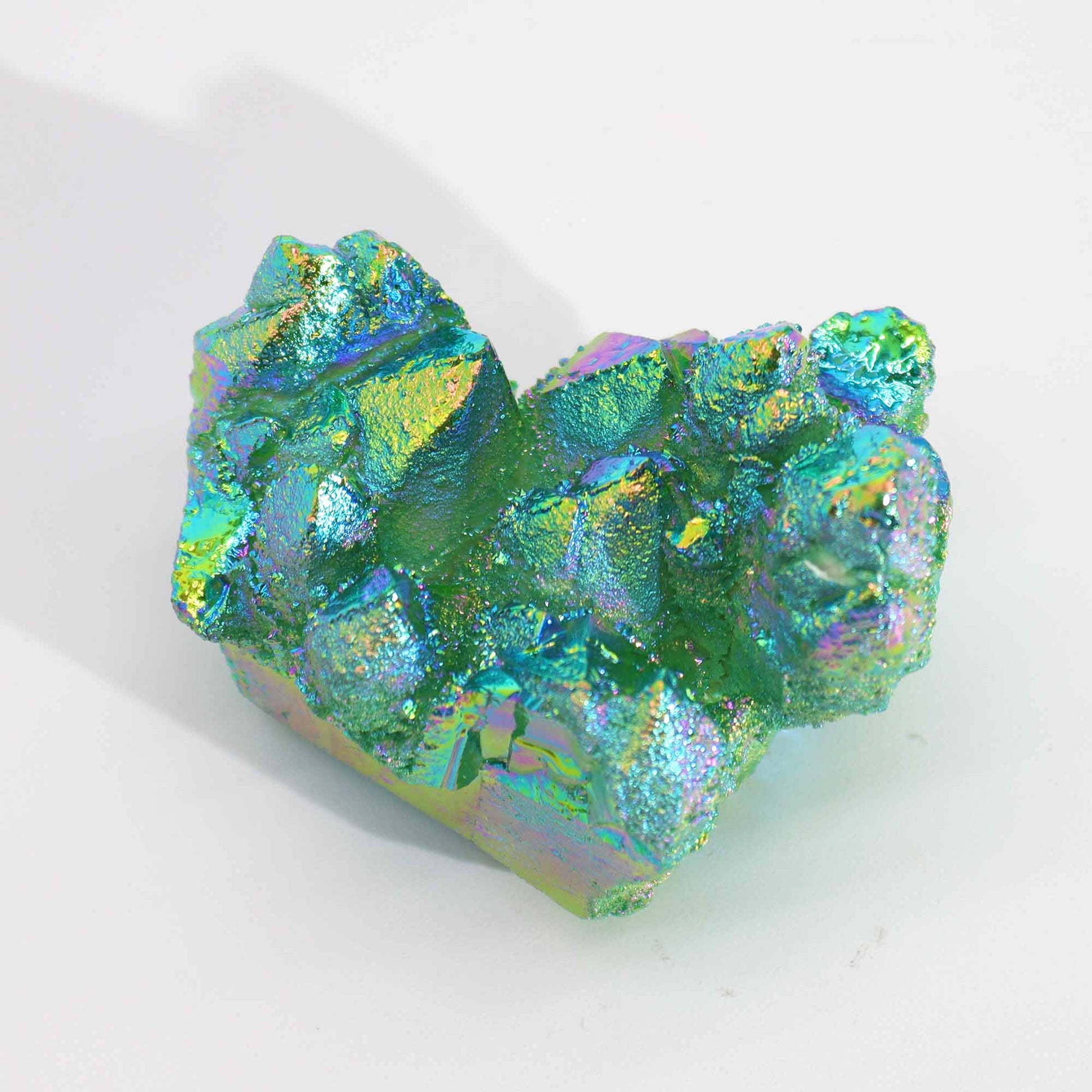 Handcrafted Natural Crystal Quartz - Medium / Aura Green Flame product packaging on clean background from Quintessential Holistic Health Ltd