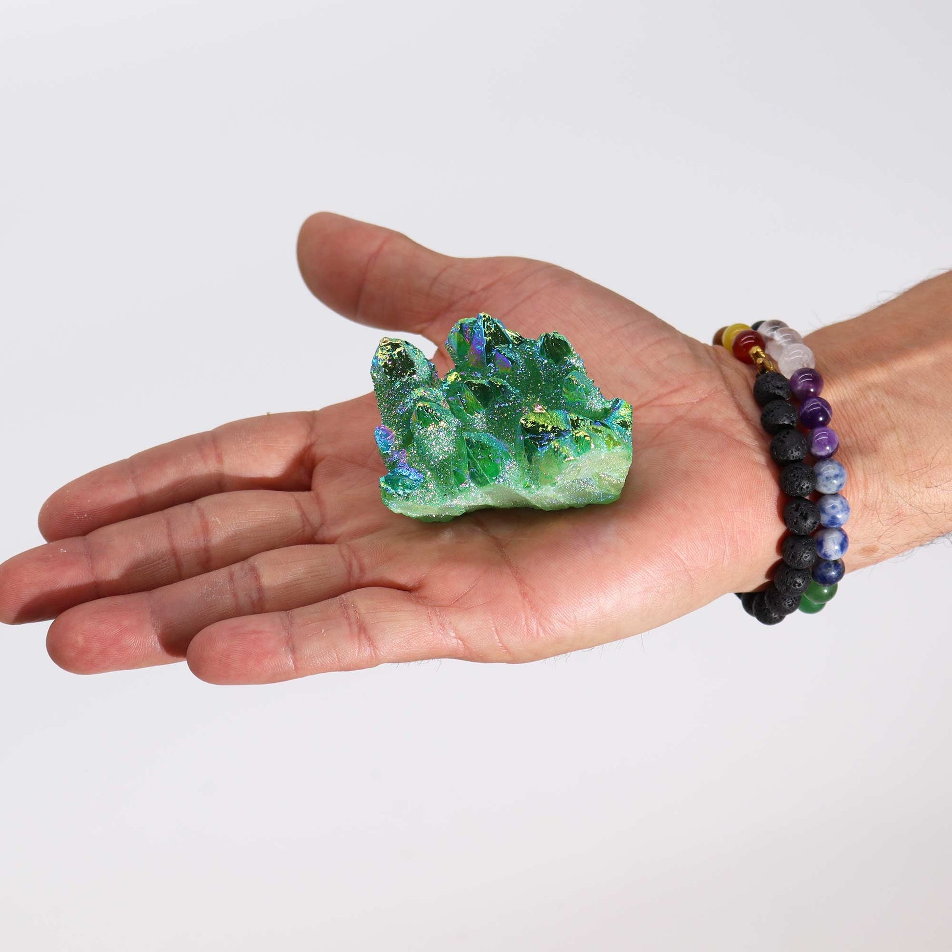 Handcrafted Natural Crystal Quartz - Medium / Aura Green Flame product packaging on clean background from Quintessential Holistic Health Ltd