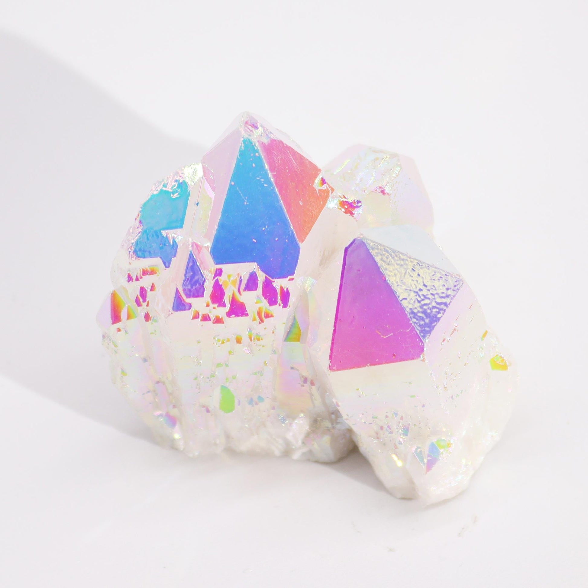 Handcrafted Natural Crystal Quartz - Medium / Aura Angel product packaging on clean background from Quintessential Holistic Health Ltd