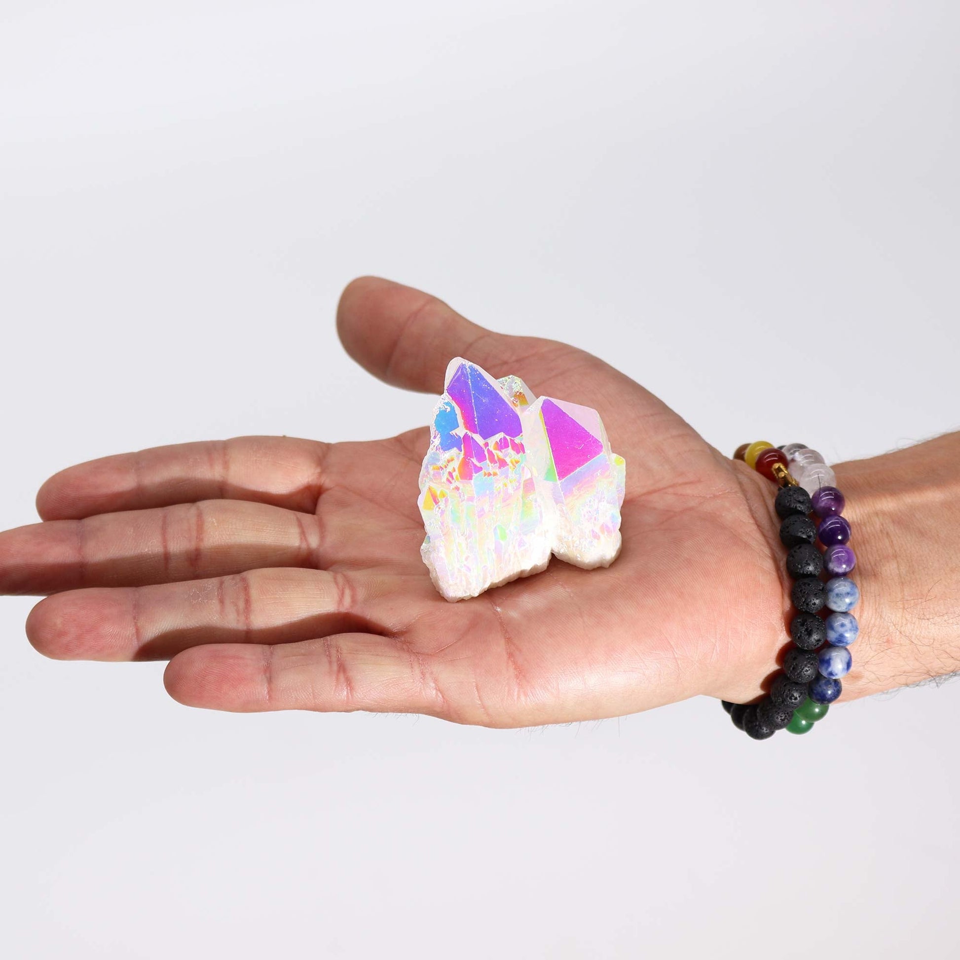 Handcrafted Natural Crystal Quartz - Medium / Aura Angel product packaging on clean background from Quintessential Holistic Health Ltd
