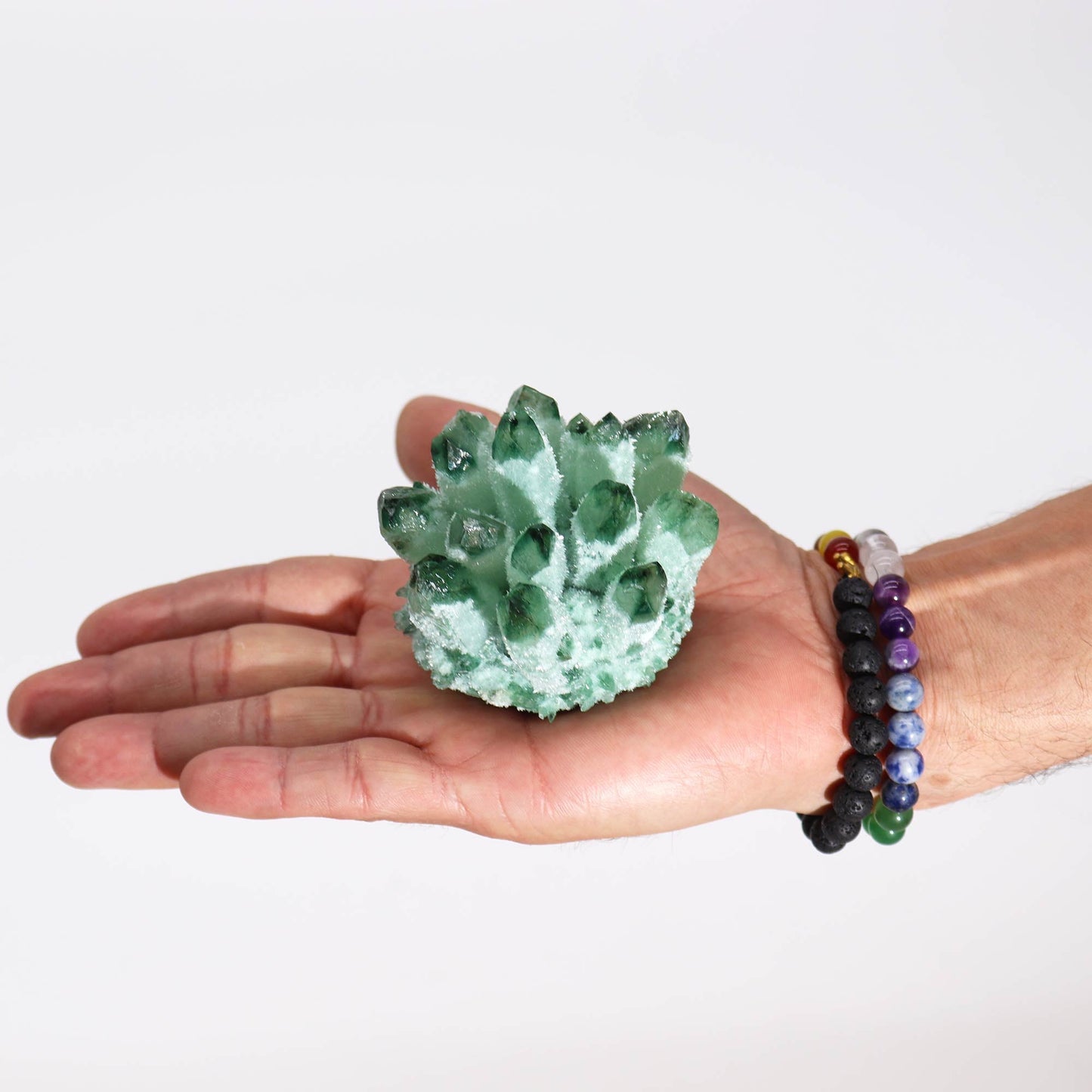 Handcrafted Natural Crystal Quartz - Green Ghost product packaging on clean background from Quintessential Holistic Health Ltd