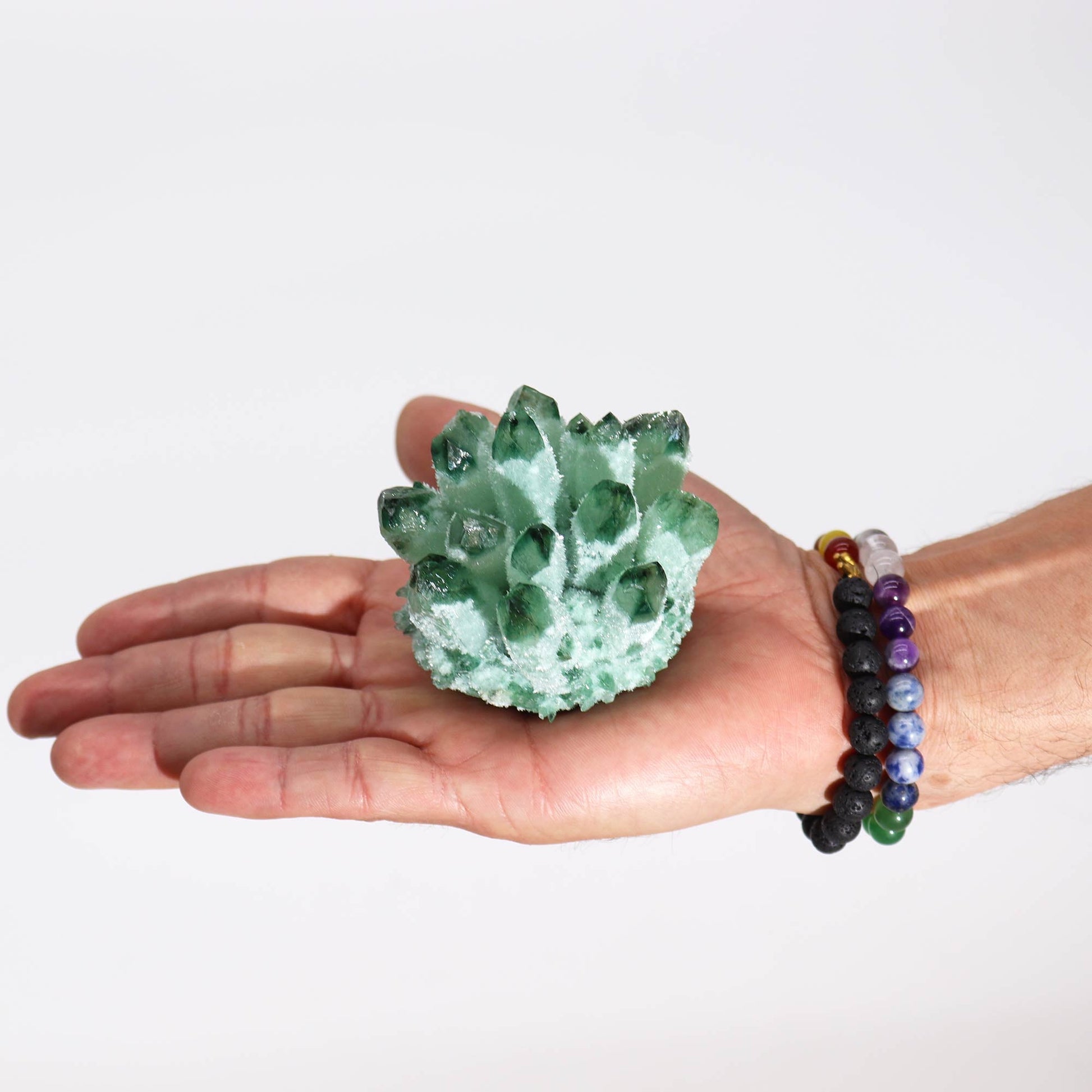 Handcrafted Natural Crystal Quartz - Green Ghost product packaging on clean background from Quintessential Holistic Health Ltd