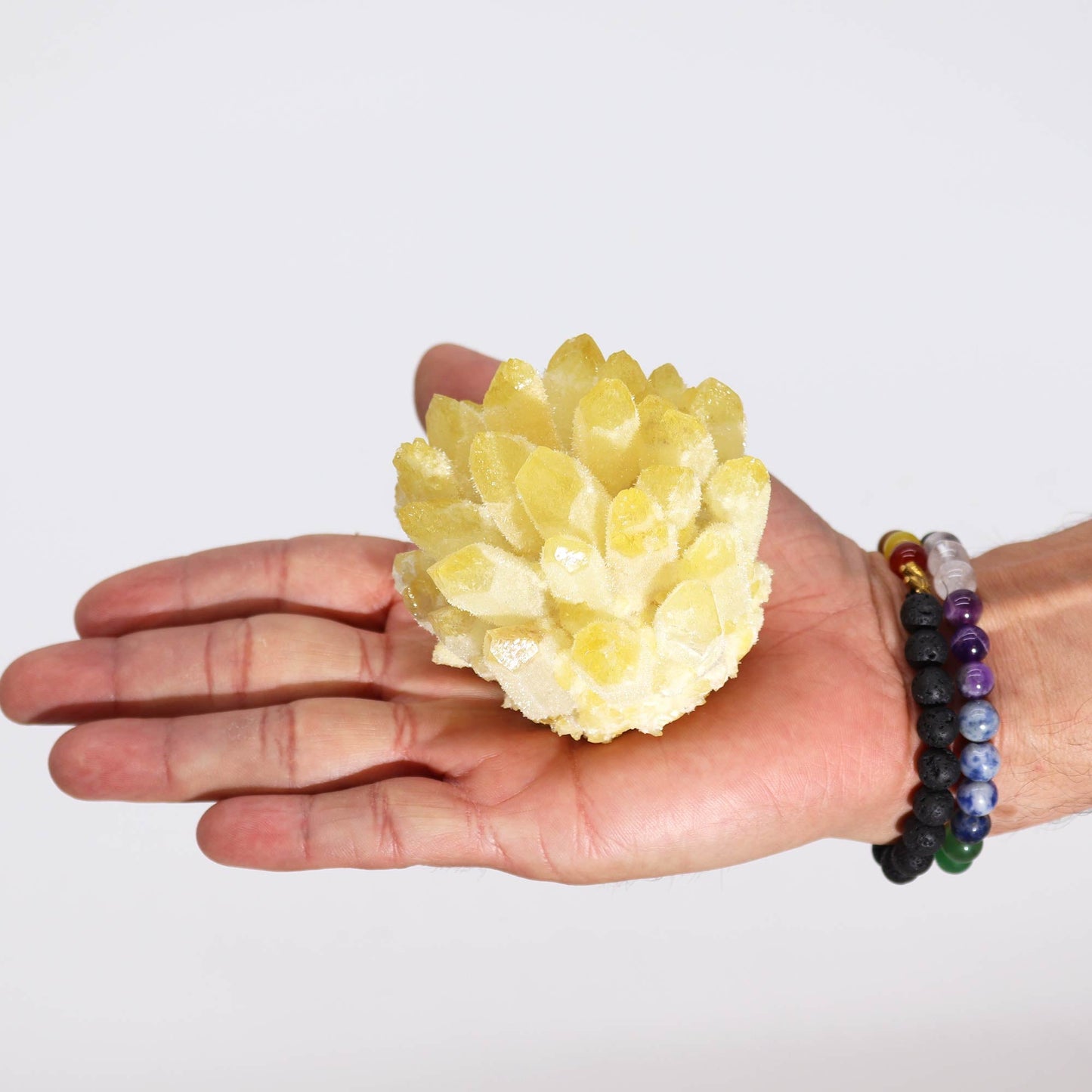 Handcrafted Natural Crystal Quartz - Yellow Ghost product packaging on clean background from Quintessential Holistic Health Ltd