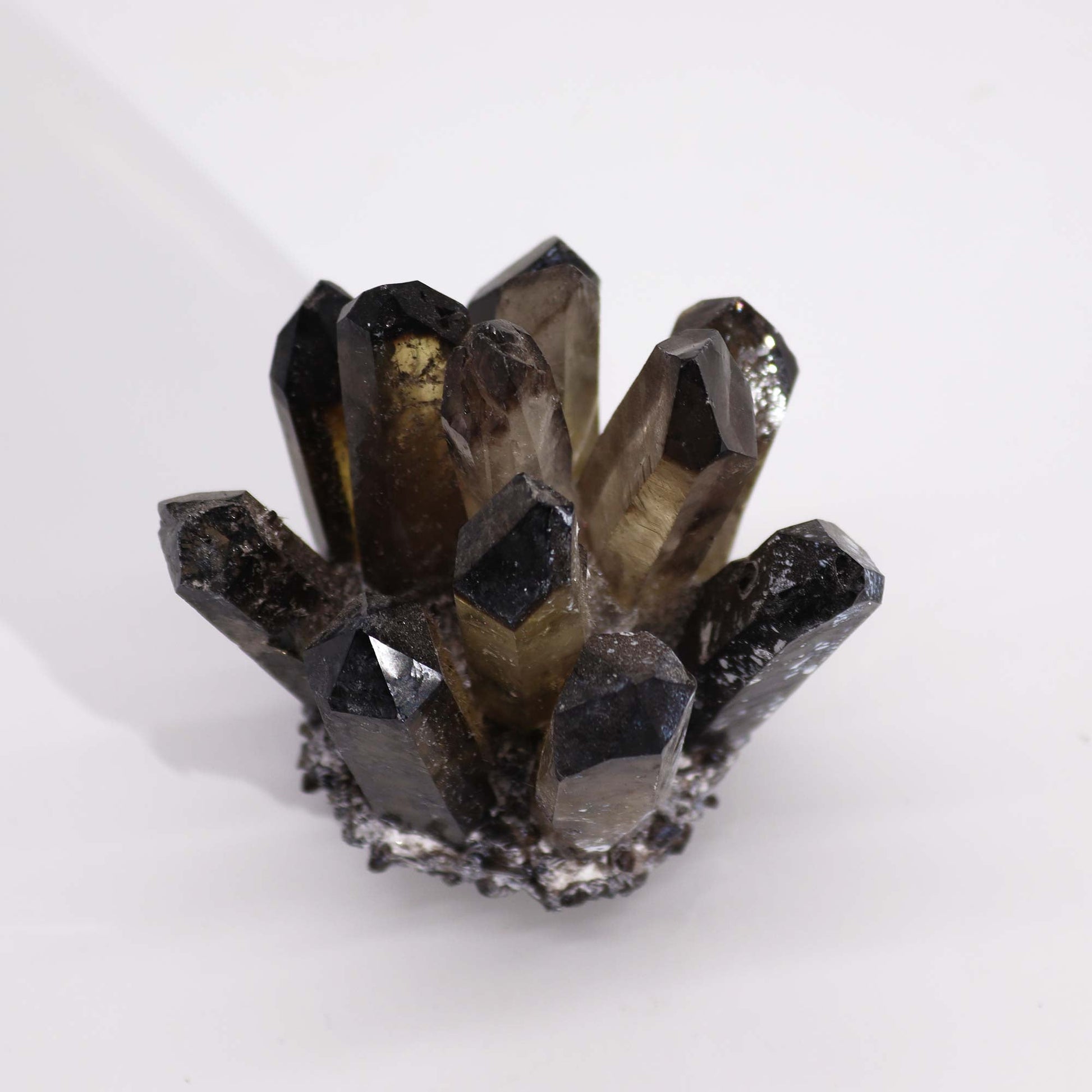 Handcrafted Natural Crystal Quartz - Smoky Ghost product packaging on clean background from Quintessential Holistic Health Ltd