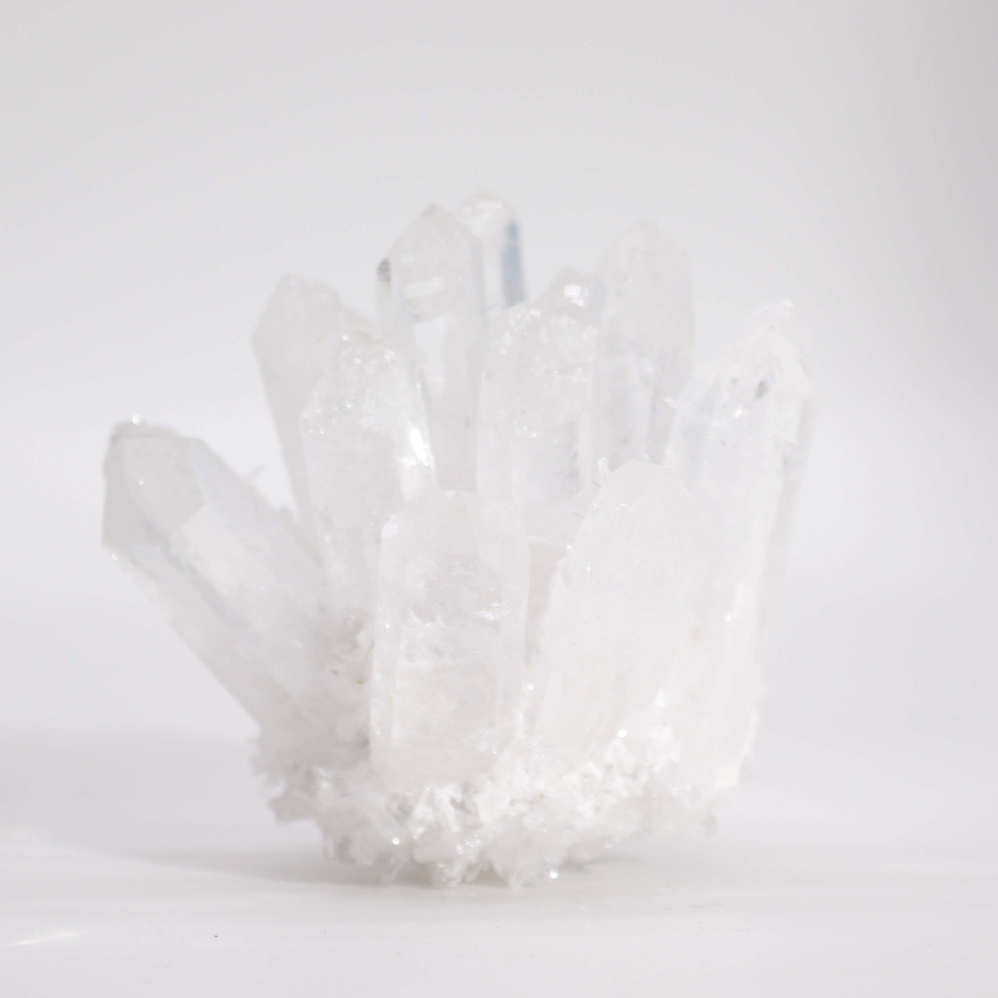 Handcrafted Natural Crystal Quartz - Clear Ghost product packaging on clean background from Quintessential Holistic Health Ltd