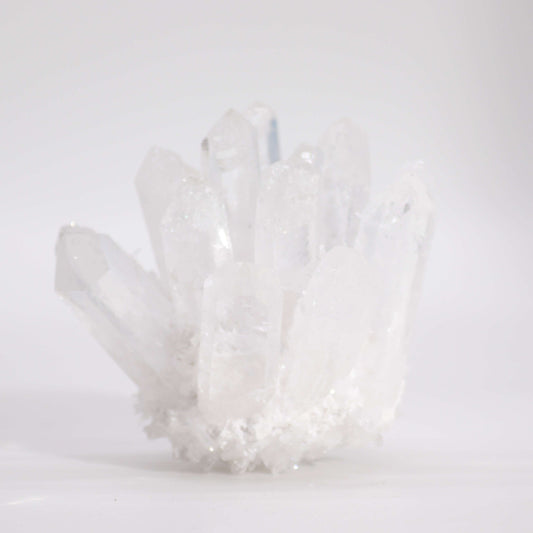 Handcrafted Natural Crystal Quartz - Clear Ghost product packaging on clean background from Quintessential Holistic Health Ltd