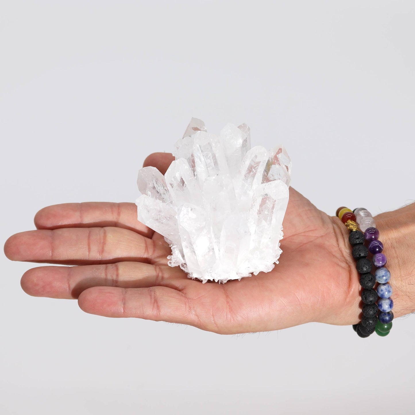 Handcrafted Natural Crystal Quartz - Clear Ghost product packaging on clean background from Quintessential Holistic Health Ltd