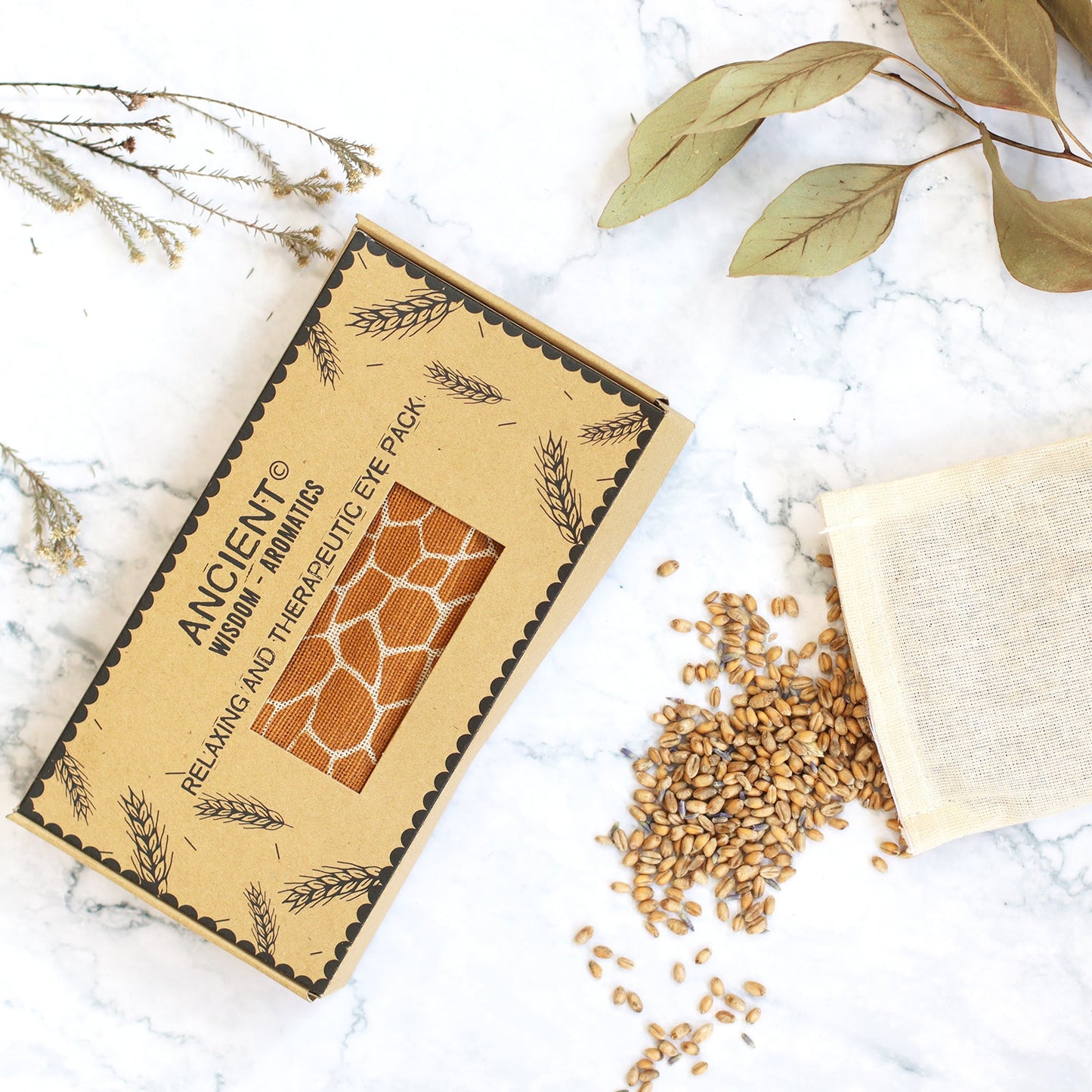 Natural Cotton and Wheat Eye Pillow in Gift Box - Madagascar Giraffe product packaging on clean background from Quintessential Holistic Health Ltd