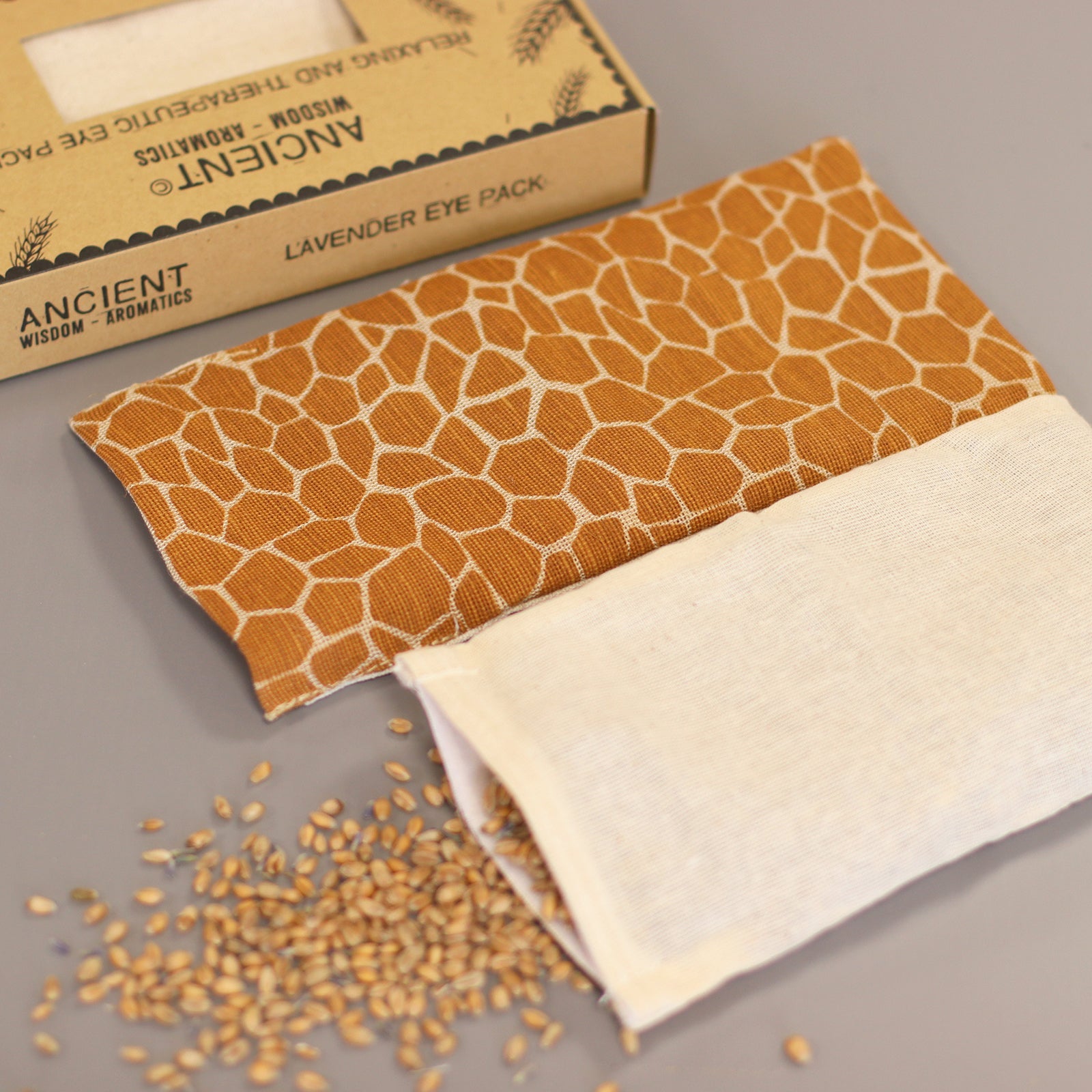 Natural Cotton and Wheat Eye Pillow in Gift Box - Madagascar Giraffe product packaging on clean background from Quintessential Holistic Health Ltd