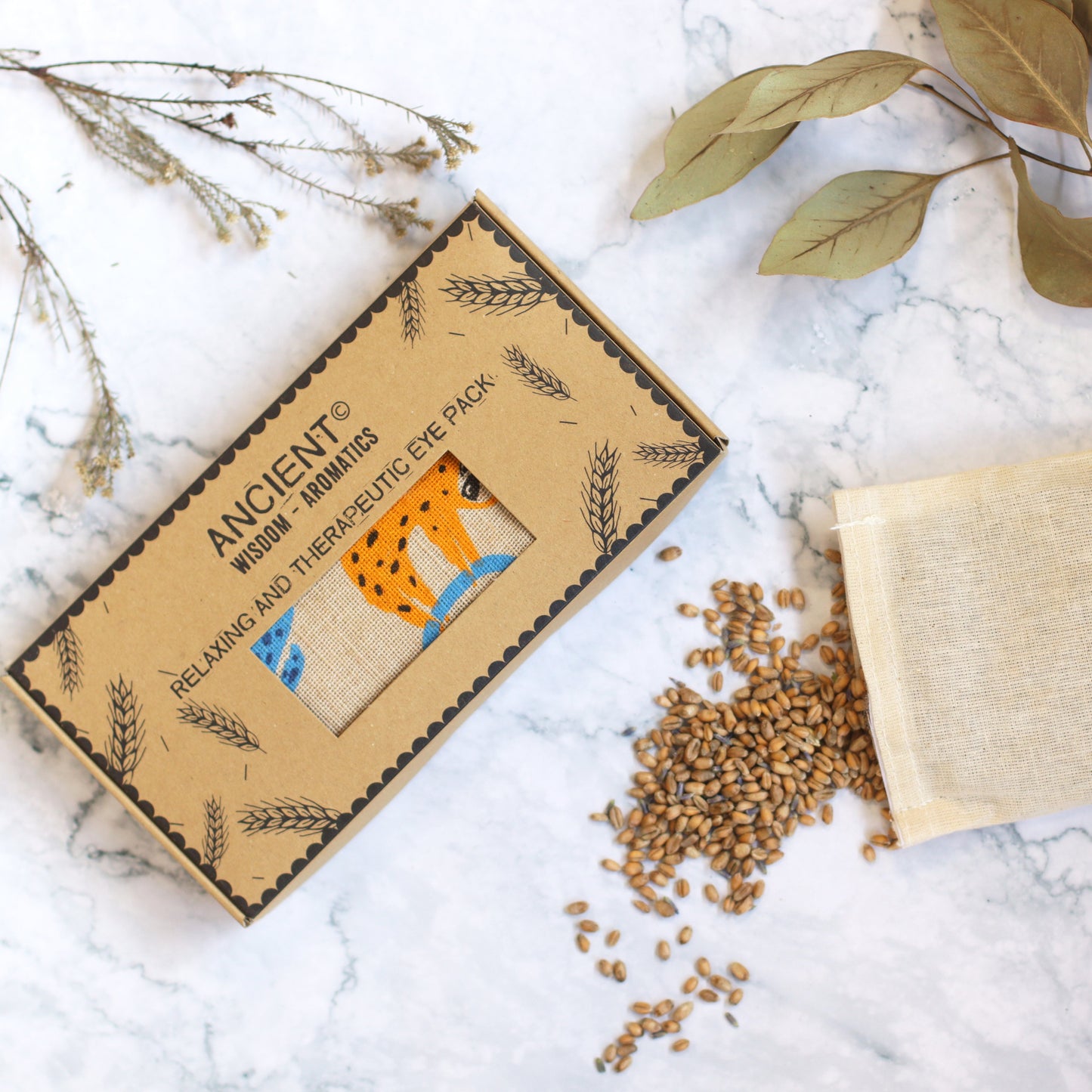 Natural Cotton and Wheat Eye Pillow in Gift Box- Lazy Sloth product packaging on clean background from Quintessential Holistic Health Ltd