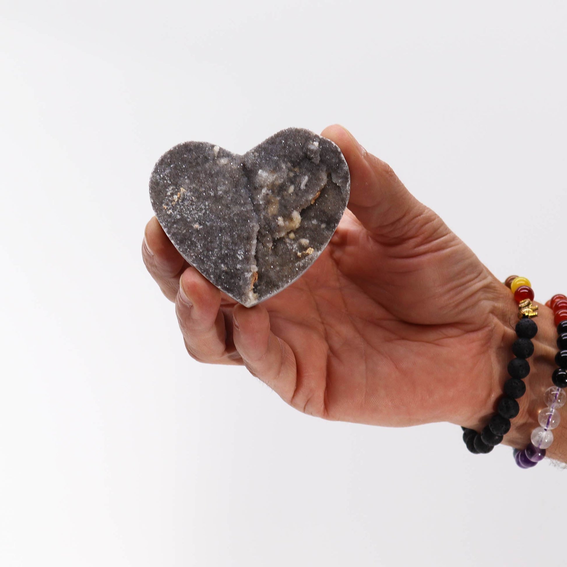 Hand Carved Natural Calcite Heart - Large product packaging on clean background from Quintessential Holistic Health Ltd