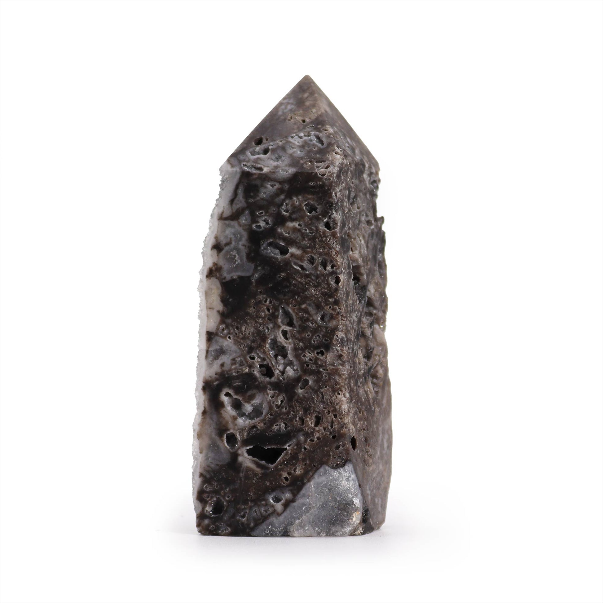 Hand Carved Natural Calcite Side Polished Tower product packaging on clean background from Quintessential Holistic Health Ltd