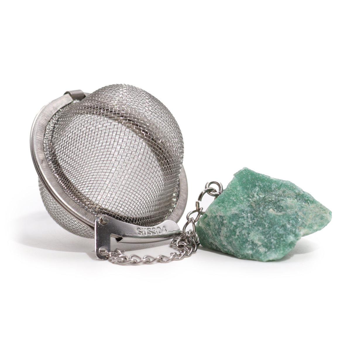 Green Aventurine Raw Gemstone Tea Strainer, Prosperity with an open silver mesh ball beside a large rough green stone by Quintessential Holistic Health Ltd