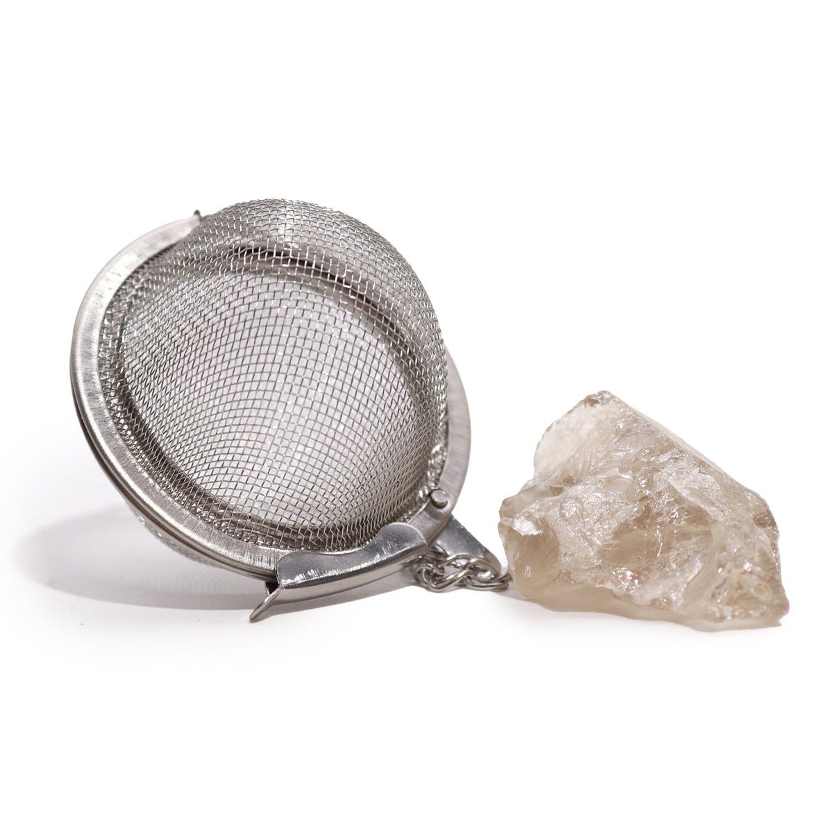 Raw Crystal Tea Strainer - Smoky Quartz, Intuition, with an open silver mesh infuser beside a rough translucent crystal by Quintessential Holistic Health Ltd