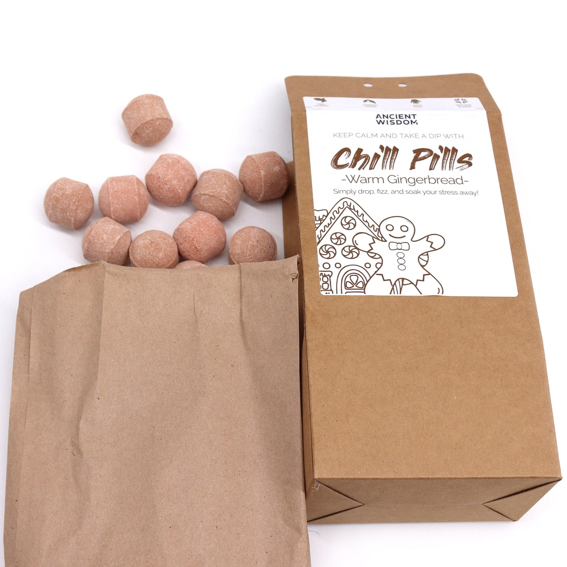 Bath Bomb Chill Pills Gift Pack - Warm Gingerbread - 350g, brown box with an open paper bag and scattered pink-brown balls by Quintessential Holistic Health Ltd