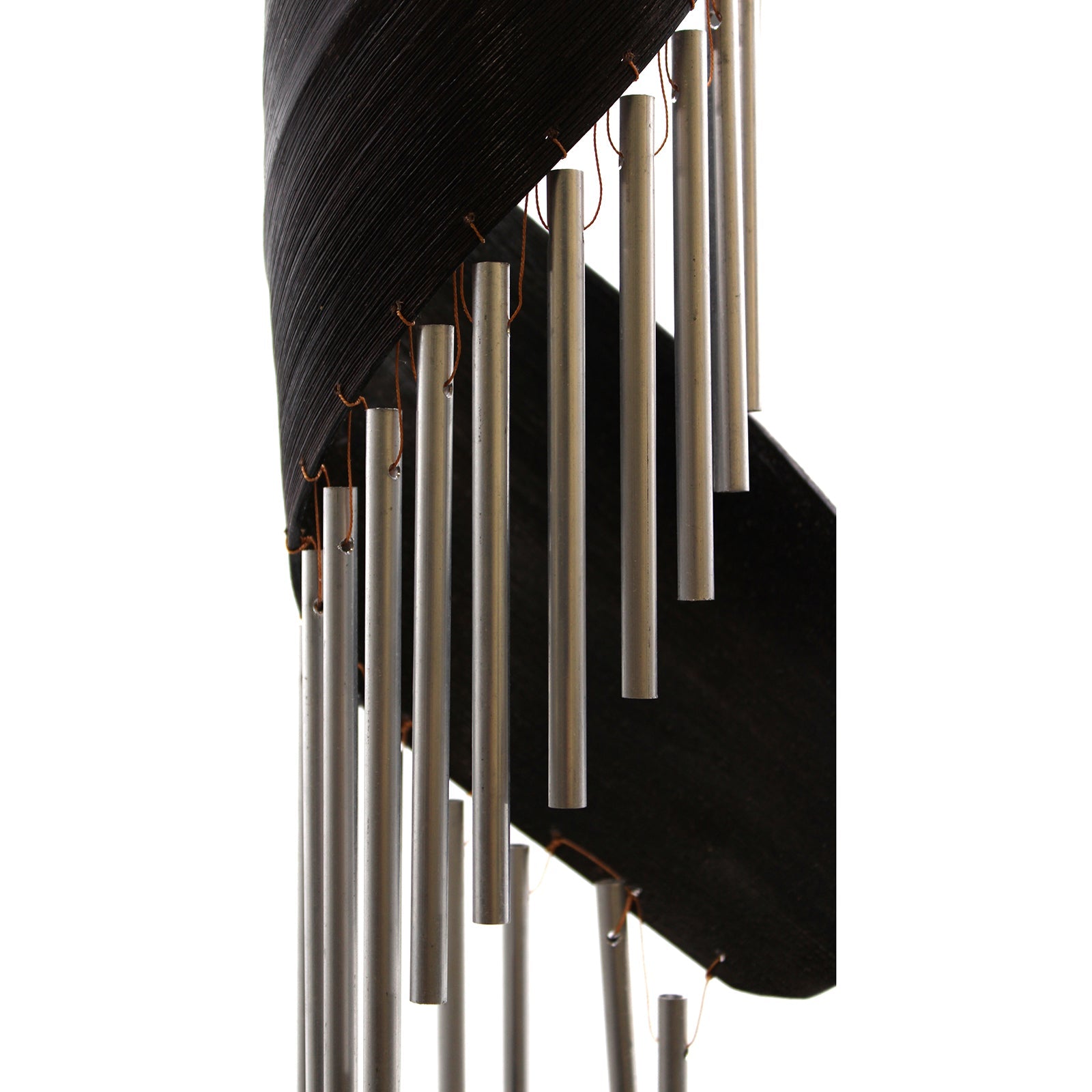 Handcrafted Coconut Leaf Wind Chime - Chocolate close-up showing dark curved leaf panels and descending silver-tone tubes by Quintessential Holistic Health Ltd