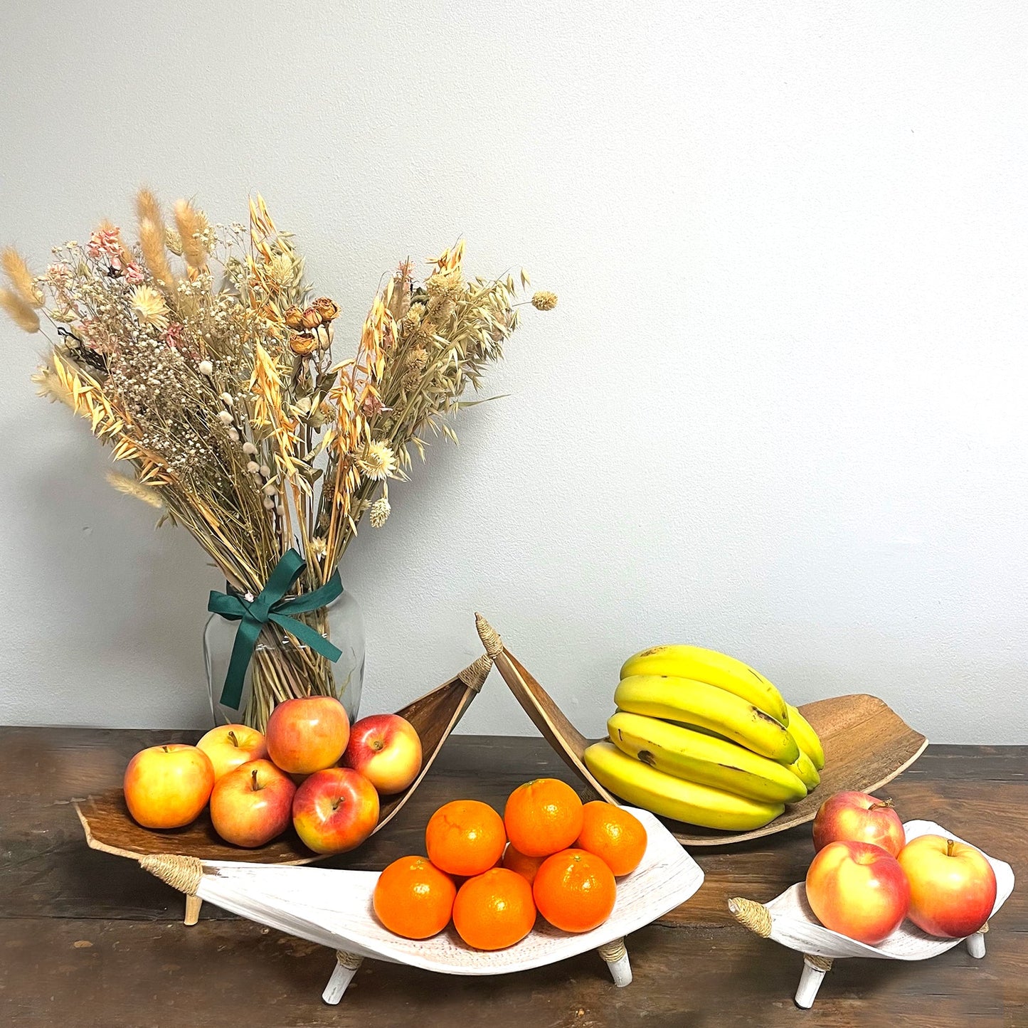 Coconut Leaf Eco-Friendly Fruit Bowl Set of 3 - Whitewash displaying apples, oranges and bananas beside dried flowers by Quintessential Holistic Health Ltd