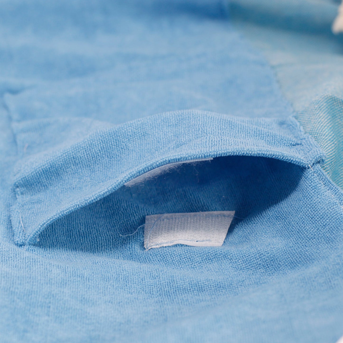 Handcrafted Cotton Pareo Towel, Wrap or Shawl - Sky Blue and White Stripes product packaging on clean background from Quintessential Holistic Health Ltd