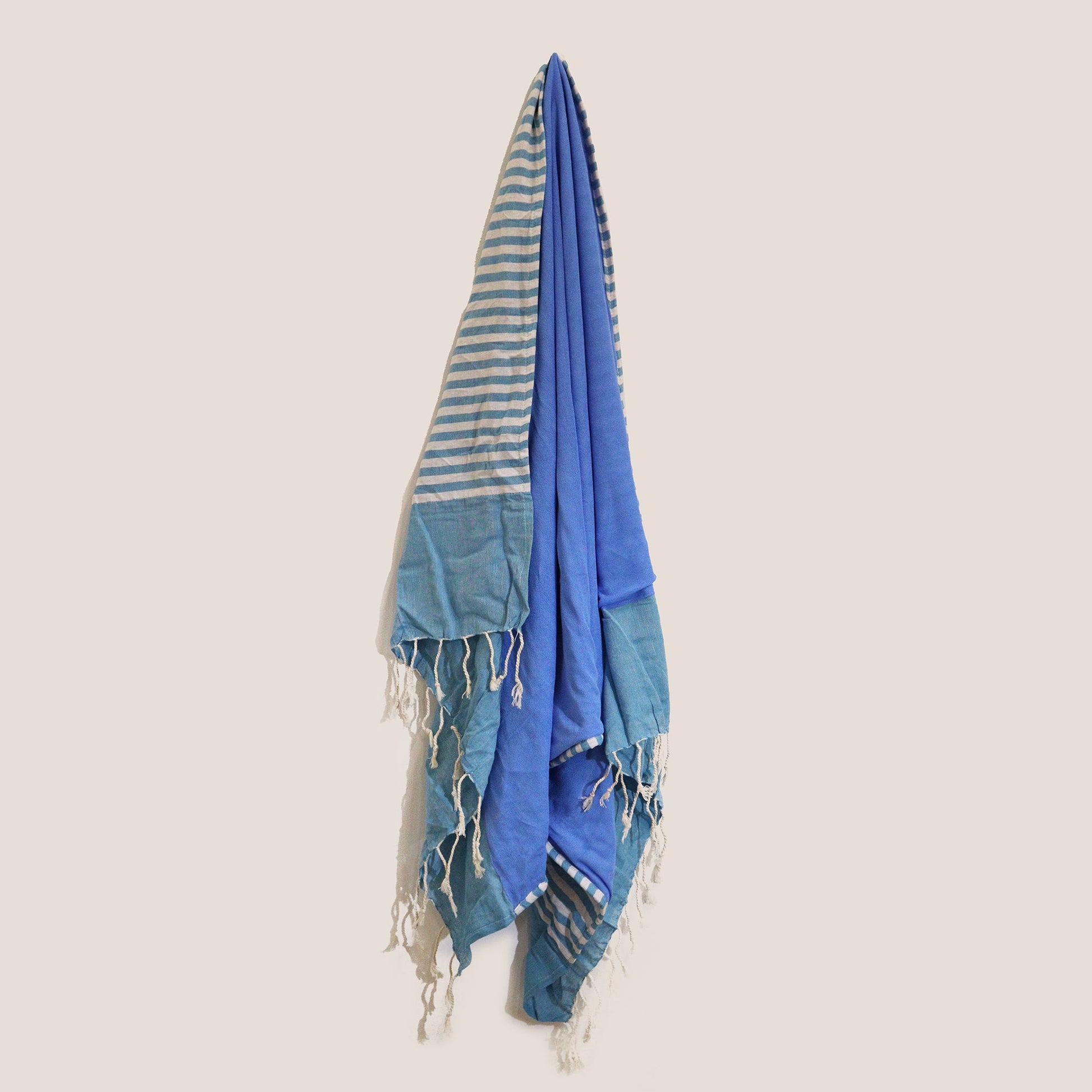 Handcrafted Cotton Pareo Towel, Wrap or Shawl - Sky Blue and White Stripes product packaging on clean background from Quintessential Holistic Health Ltd