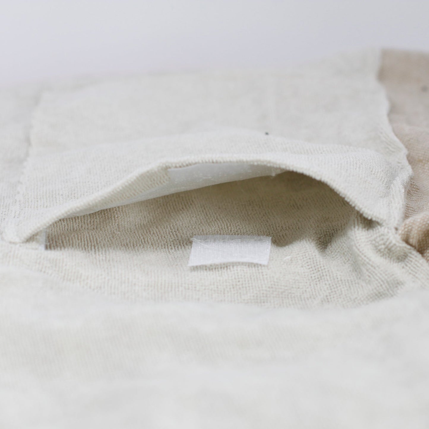Handcrafted Cotton Pareo Towel, Wrap or Shawl - Warm Sand and White Stripes product packaging on clean background from Quintessential Holistic Health Ltd