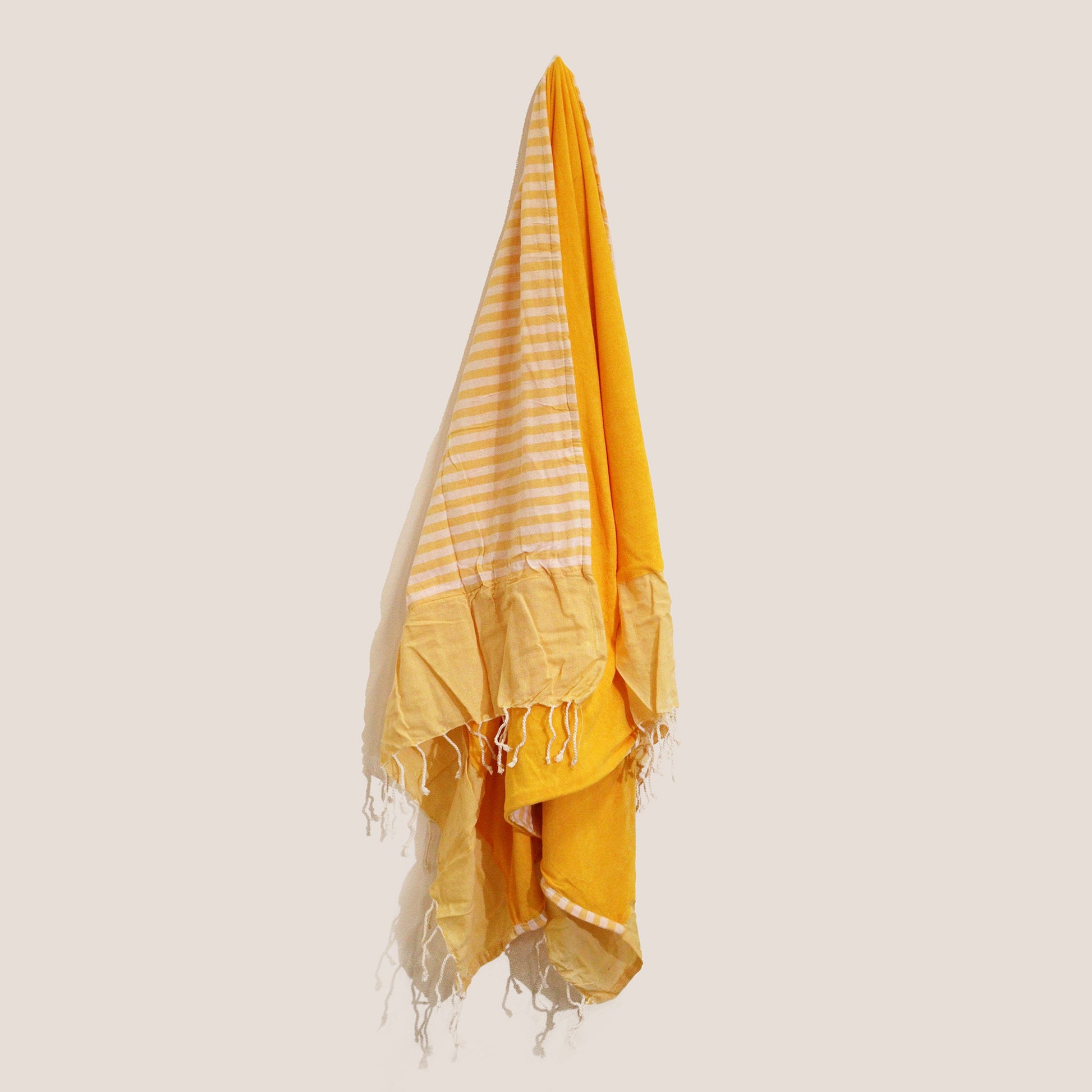Handcrafted Cotton Pareo Towel, Wrap or Shawl - Sunny Yellow and White Stripes product packaging on clean background from Quintessential Holistic Health Ltd