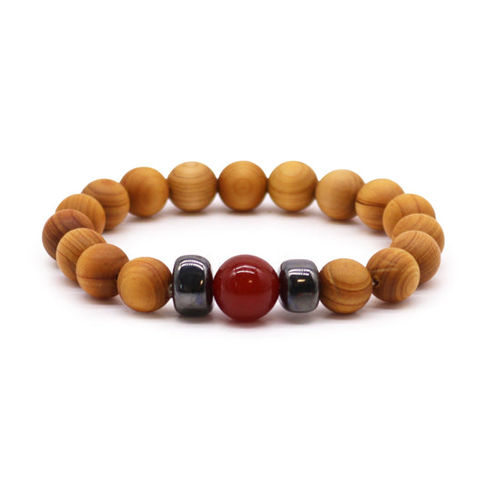 Unisex Cedarwood Root Chakra Bracelet with Red Jasper product packaging on clean background from Quintessential Holistic Health Ltd