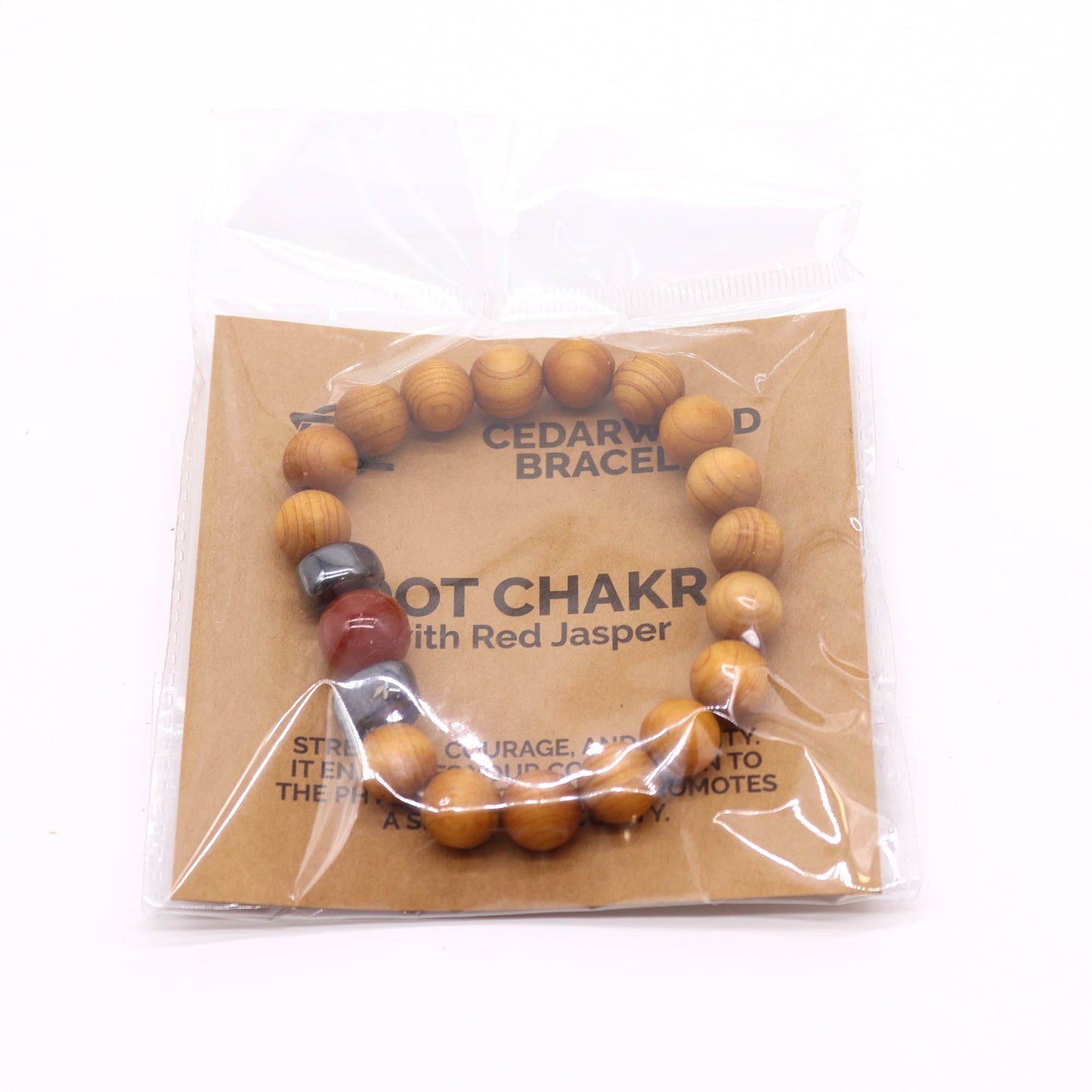 Unisex Cedarwood Root Chakra Bracelet with Red Jasper product packaging on clean background from Quintessential Holistic Health Ltd