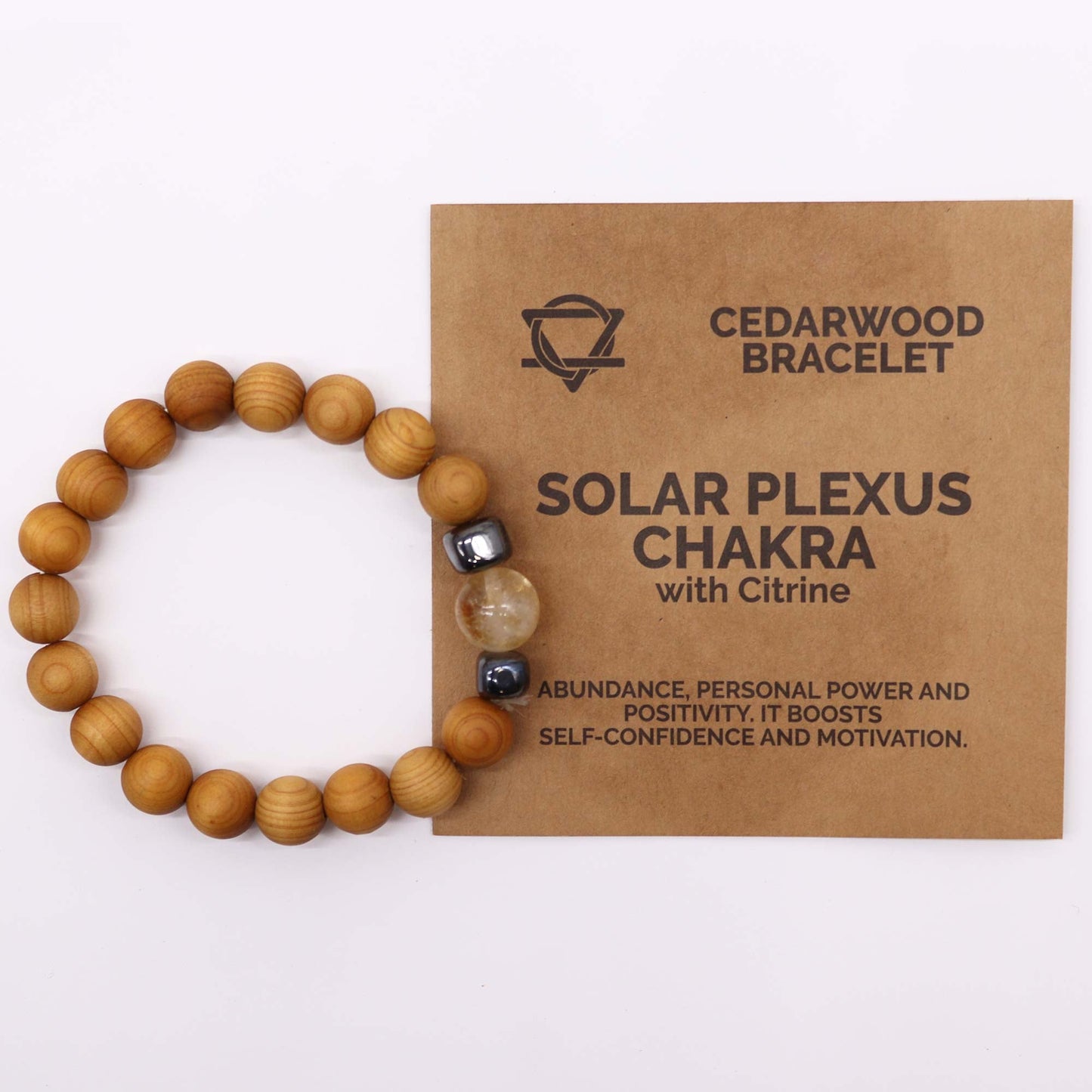 Unisex Cedarwood Solar Plexus Chakra Bracelet with Citrine product packaging on clean background from Quintessential Holistic Health Ltd