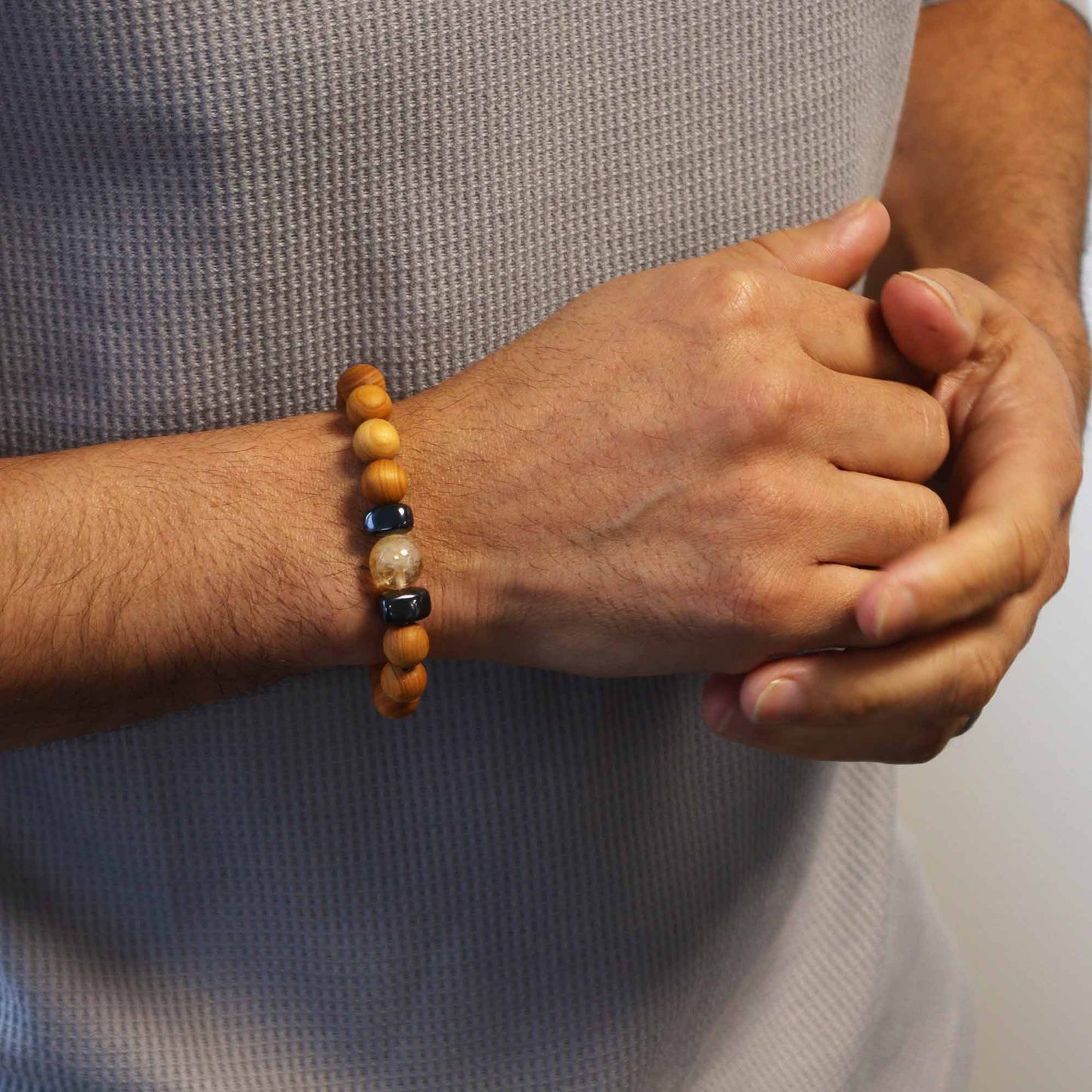 Unisex Cedarwood Solar Plexus Chakra Bracelet with Citrine product packaging on clean background from Quintessential Holistic Health Ltd