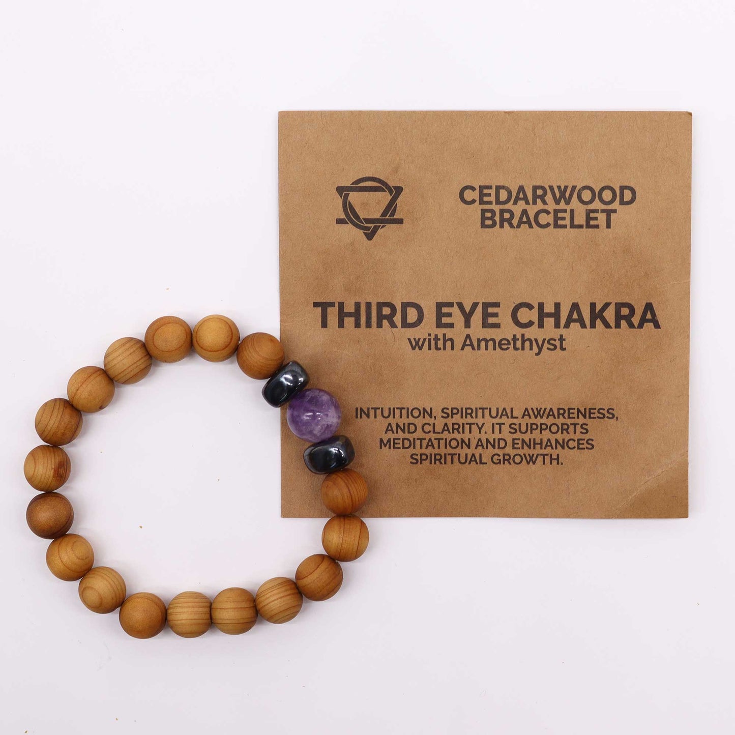 Unisex Cedarwood Third Eye Chakra Bracelet with Amethyst product packaging on clean background from Quintessential Holistic Health Ltd