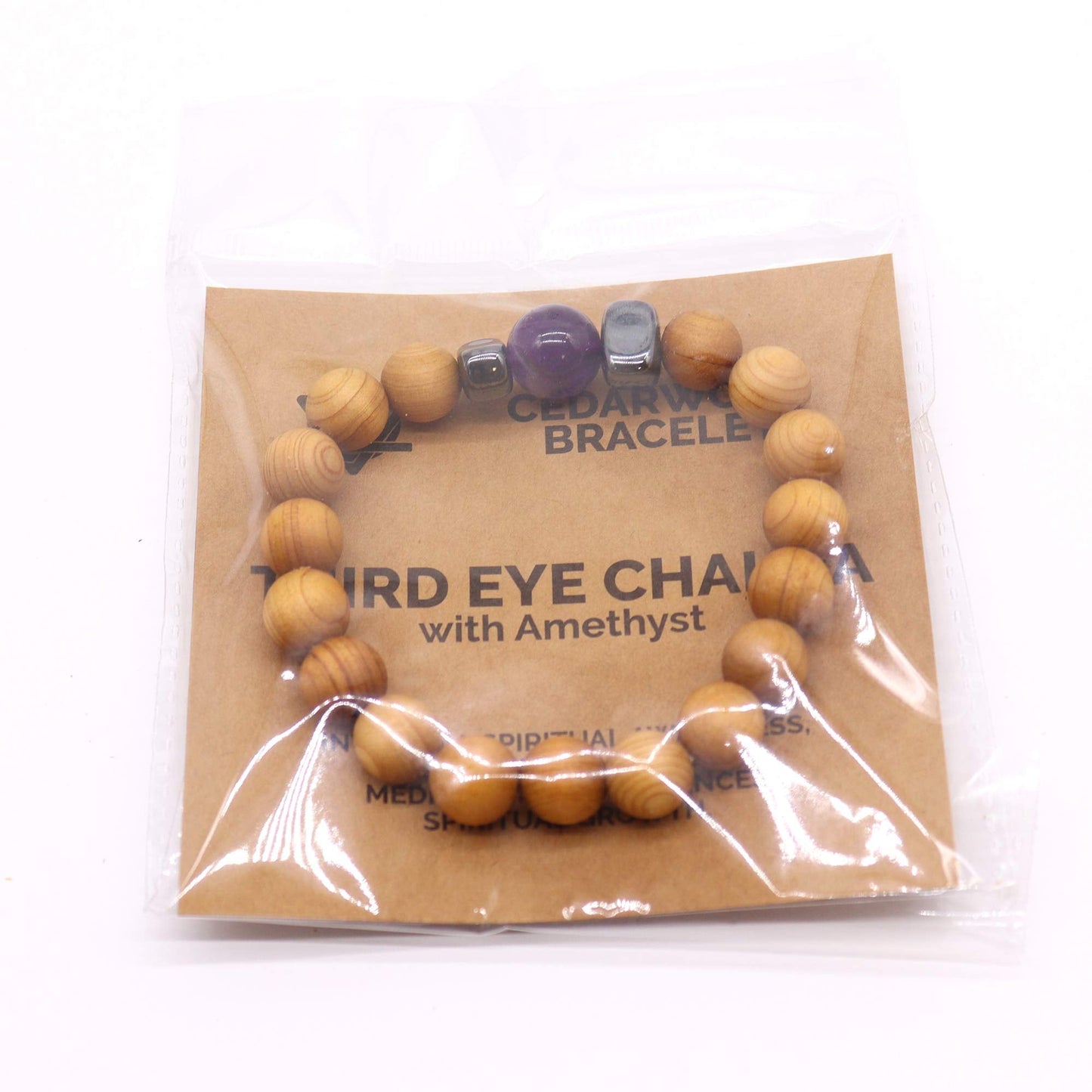 Unisex Cedarwood Third Eye Chakra Bracelet with Amethyst product packaging on clean background from Quintessential Holistic Health Ltd