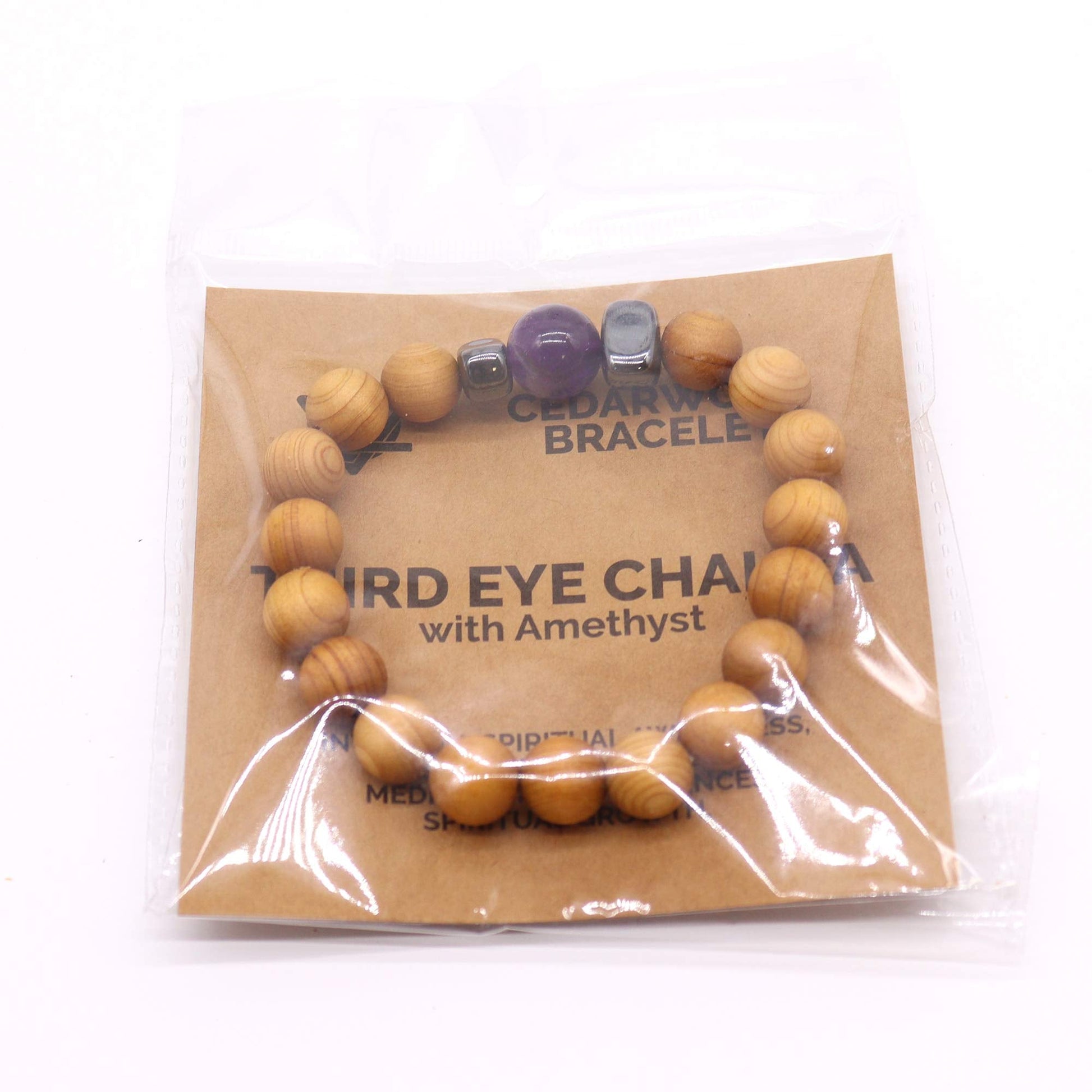 Unisex Cedarwood Third Eye Chakra Bracelet with Amethyst product packaging on clean background from Quintessential Holistic Health Ltd