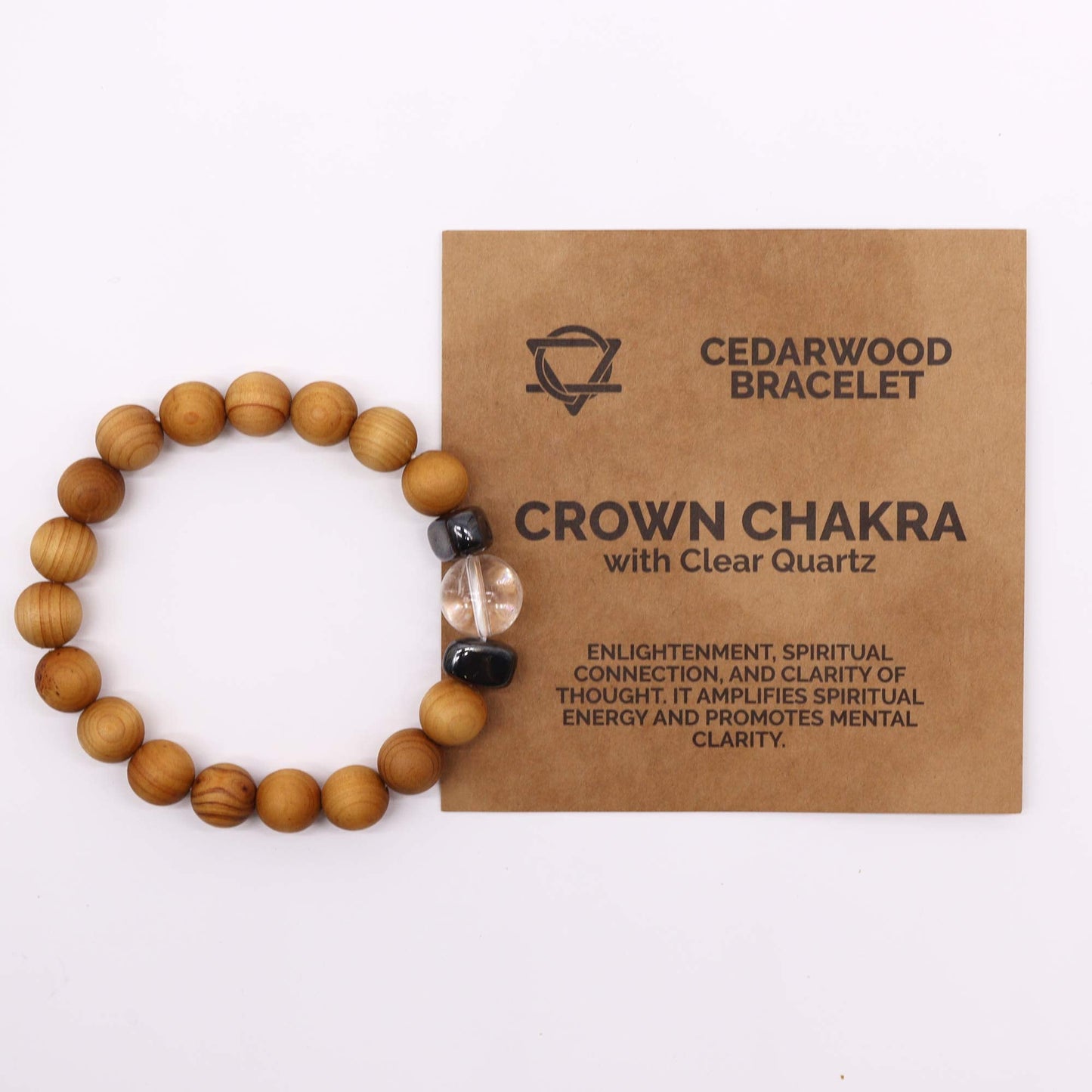 Unisex Cedarwood Crown Chakra Bracelet with Clear Quartz product packaging on clean background from Quintessential Holistic Health Ltd