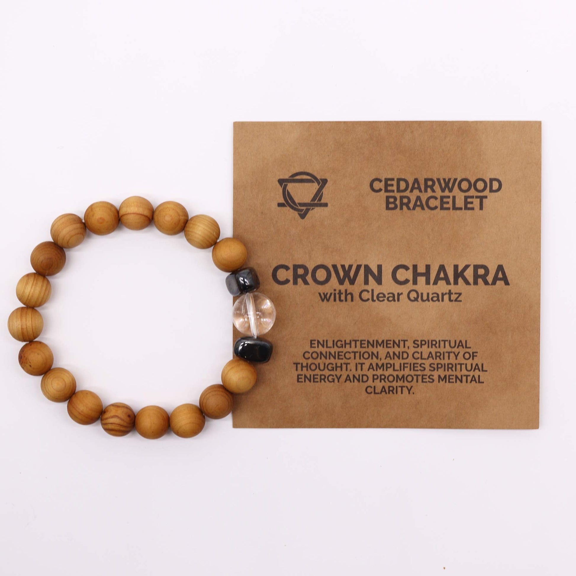 Unisex Cedarwood Crown Chakra Bracelet with Clear Quartz product packaging on clean background from Quintessential Holistic Health Ltd
