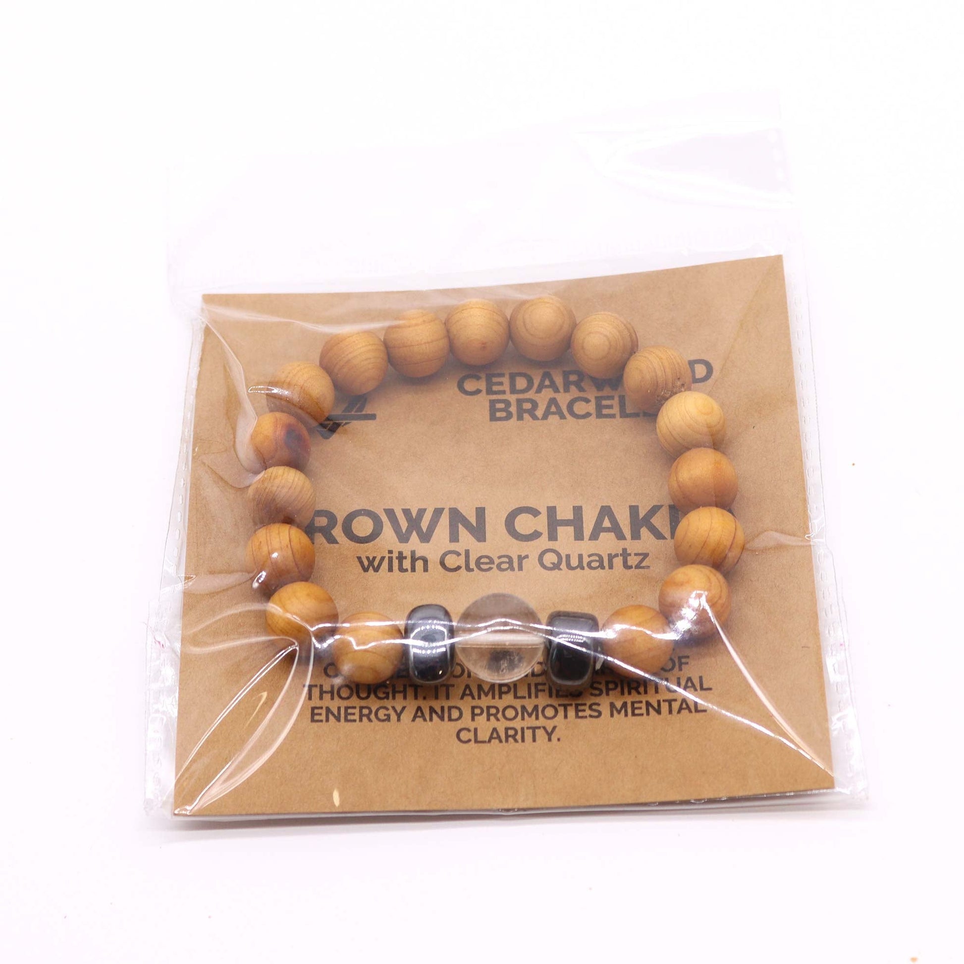 Unisex Cedarwood Crown Chakra Bracelet with Clear Quartz product packaging on clean background from Quintessential Holistic Health Ltd