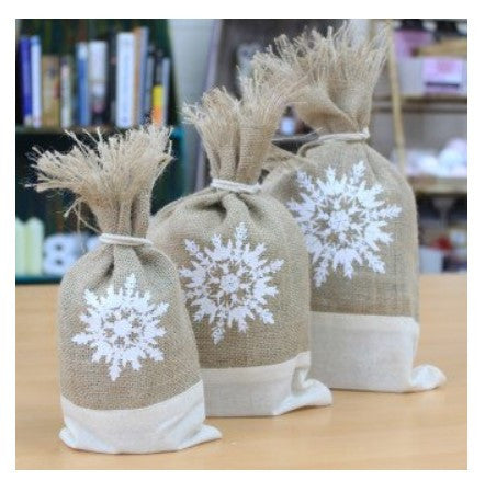Set of 3 Eco-Friendly Jute Danish Pouches - Snowflake product packaging on clean background from Quintessential Holistic Health Ltd
