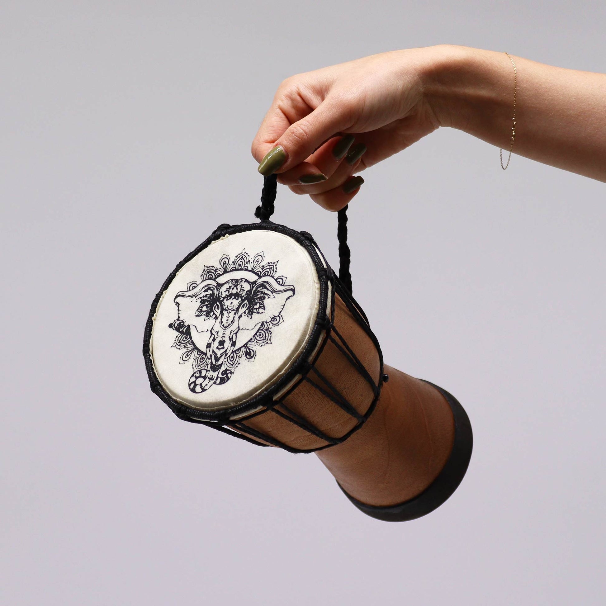 12cm Wide Top Djembe Drum - Elephant product packaging on clean background from Quintessential Holistic Health Ltd