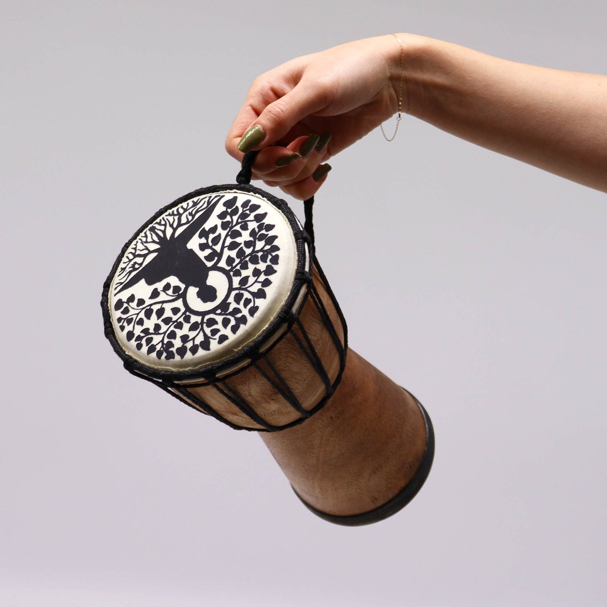 13cm Wide Top Djembe Drum - Buddha product packaging on clean background from Quintessential Holistic Health Ltd