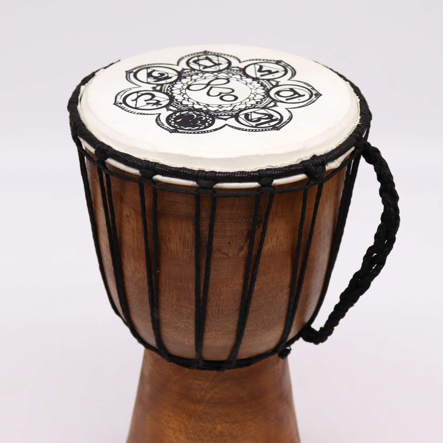 17cm Chakra Wide Top Djembe Drum - Chakra product packaging on clean background from Quintessential Holistic Health Ltd