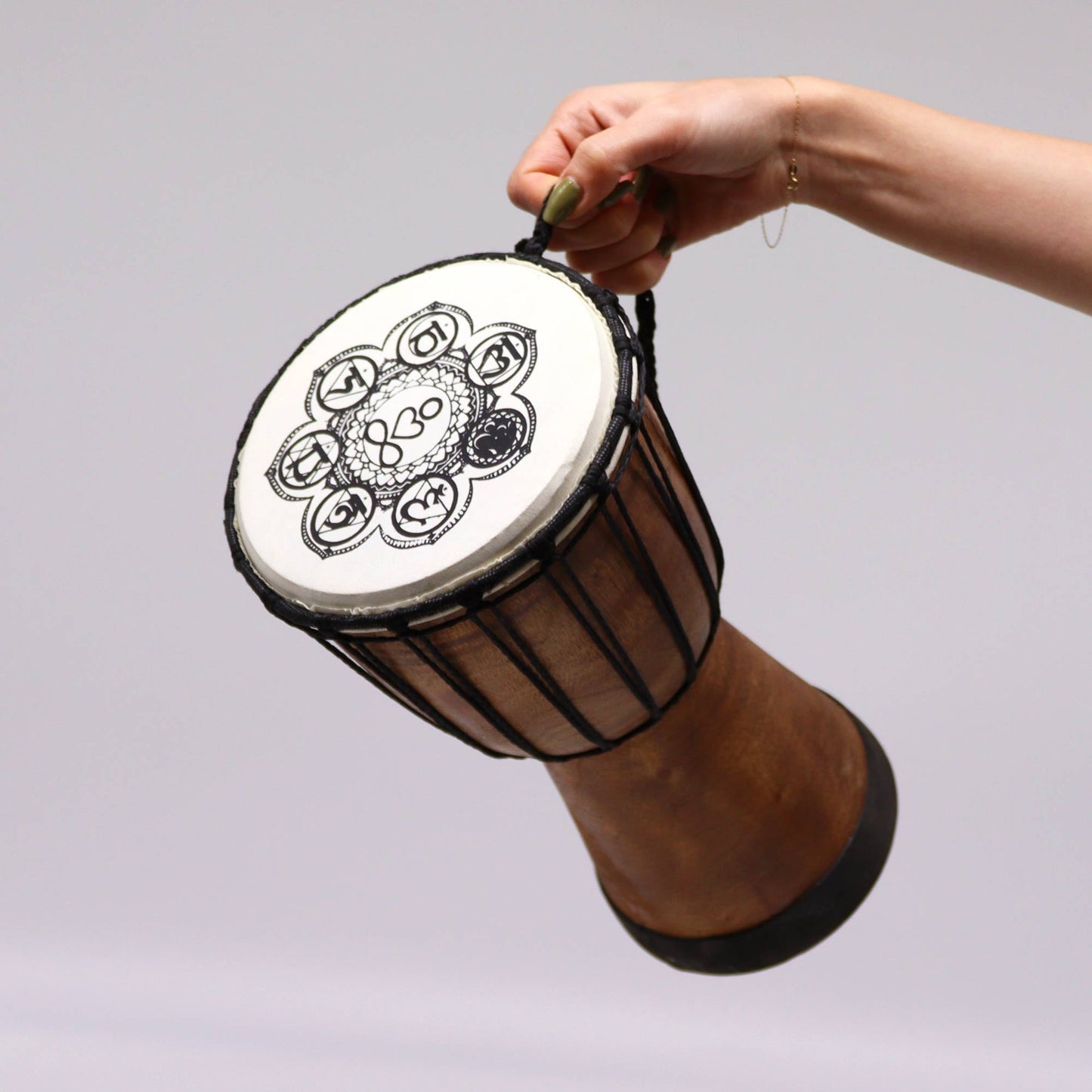 17cm Chakra Wide Top Djembe Drum - Chakra product packaging on clean background from Quintessential Holistic Health Ltd